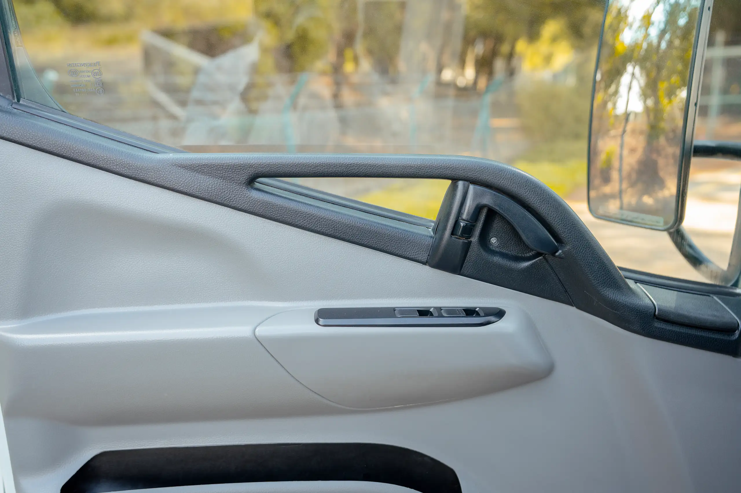 Used 2023 Mitsubishi Canter Cargo Body White – Driver Door Panel Full View at First Choice Cars Sharjah