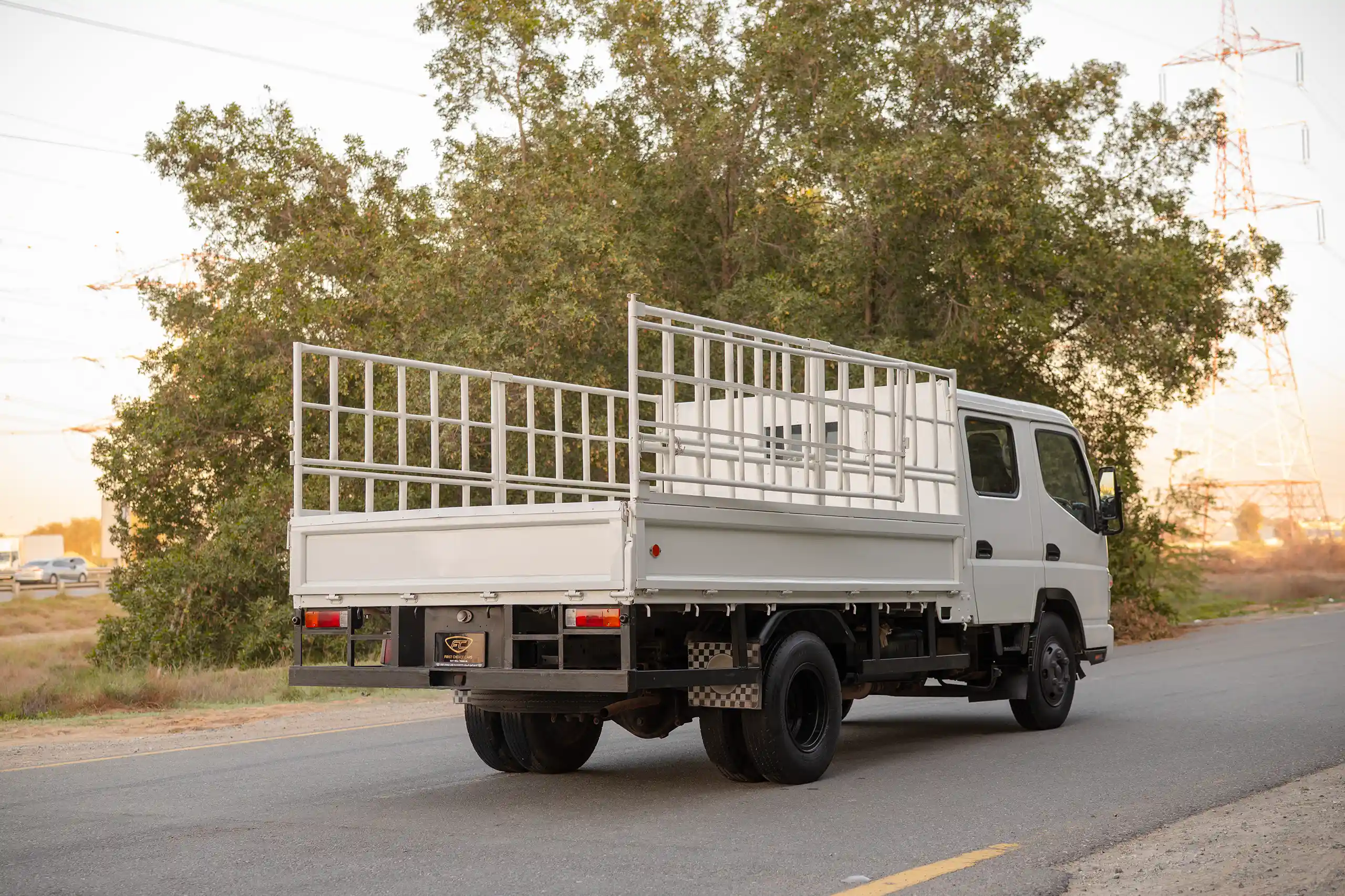 Used 2006 Mitsubishi Canter Double Cabin Cargo Body White – Right Back Diagonal (45°) View at First Choice Cars Sharjah