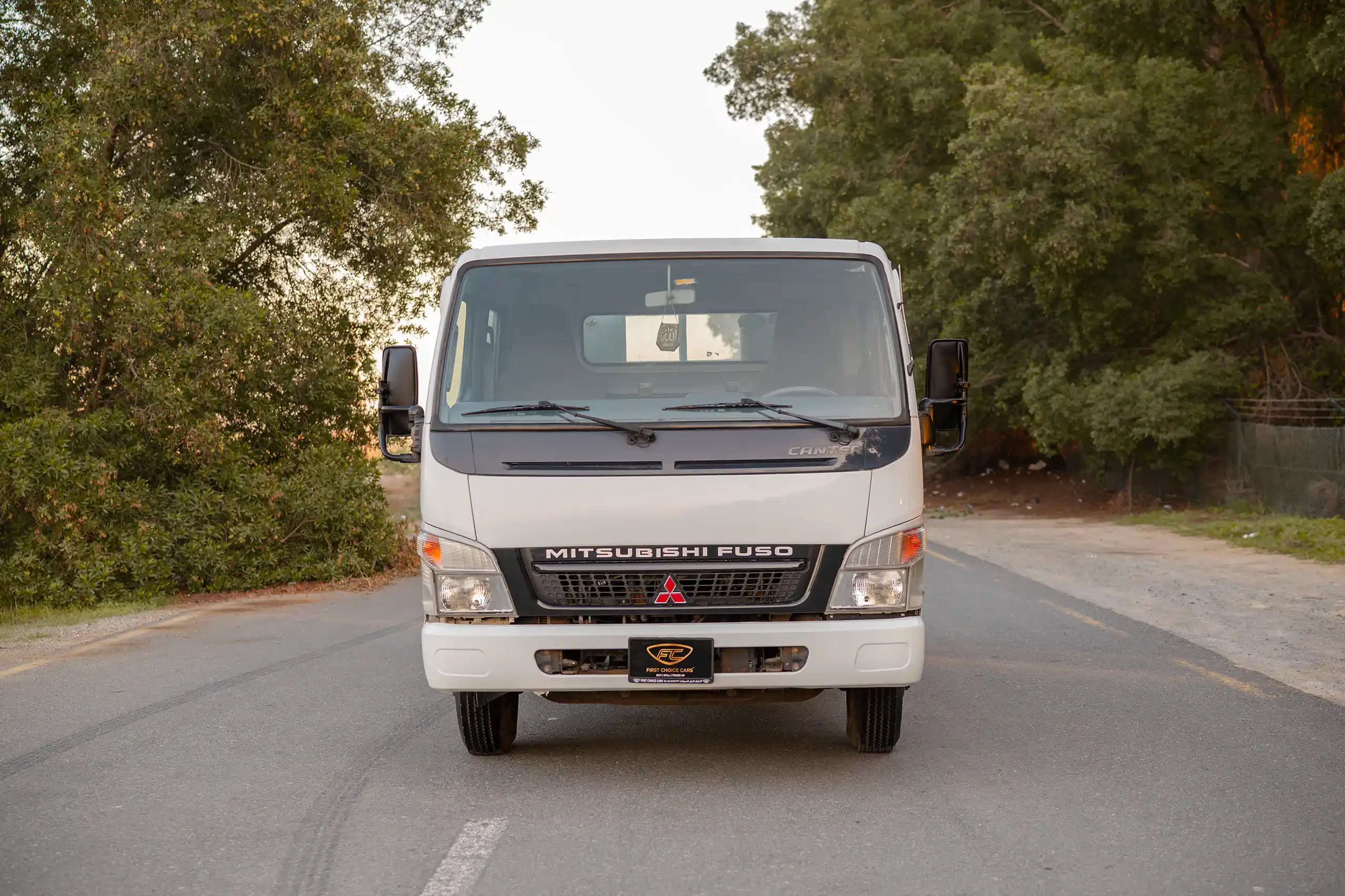 Used 2006 Mitsubishi Canter Double Cabin Cargo Body White – Front View at First Choice Cars Sharjah
