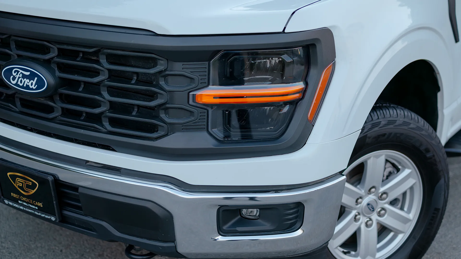 Used 2025 Ford F-150 XL in White – Headlight Close-up