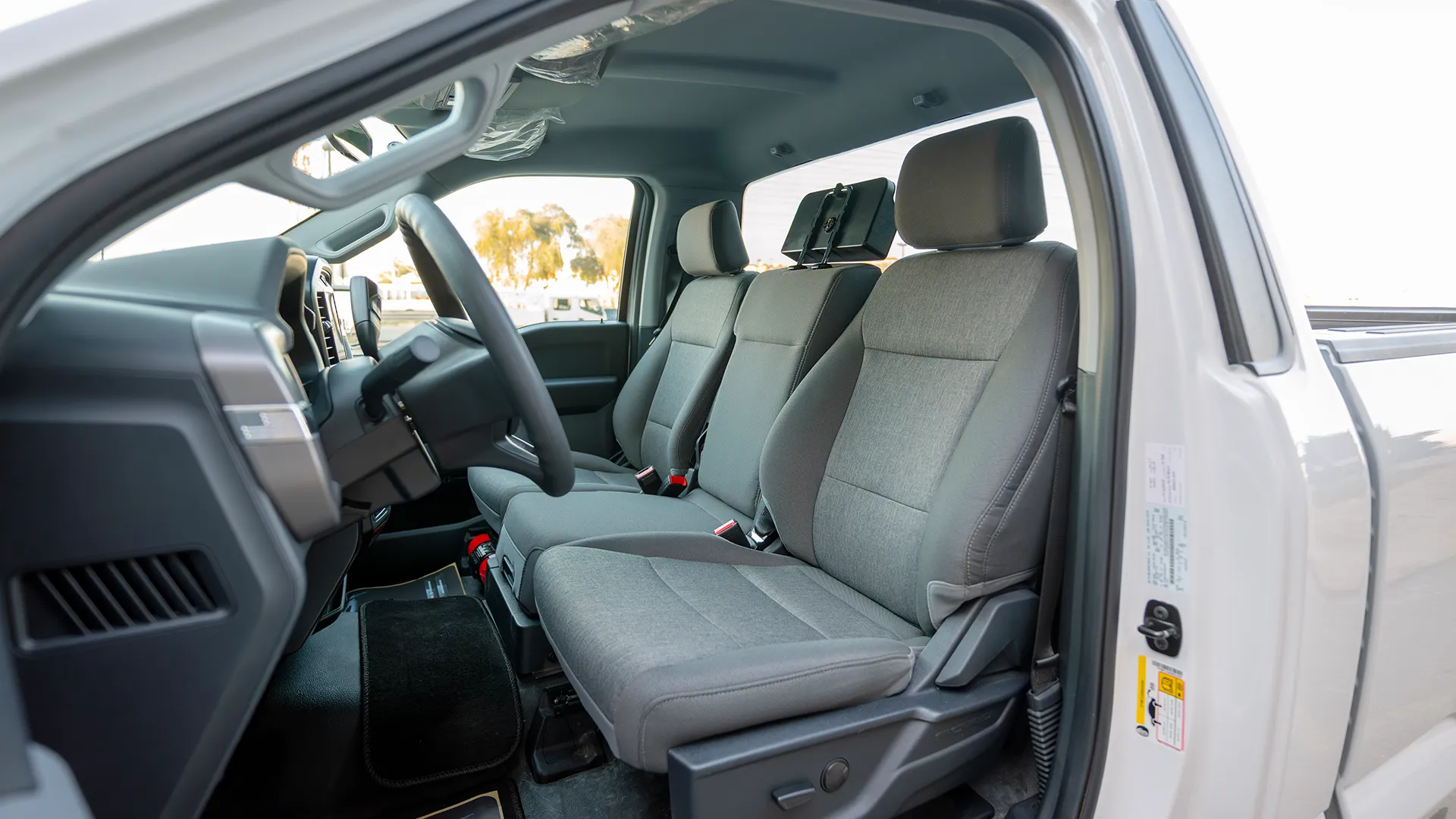Used 2025 Ford F-150 XL in White – Front Driver Side Cabin View