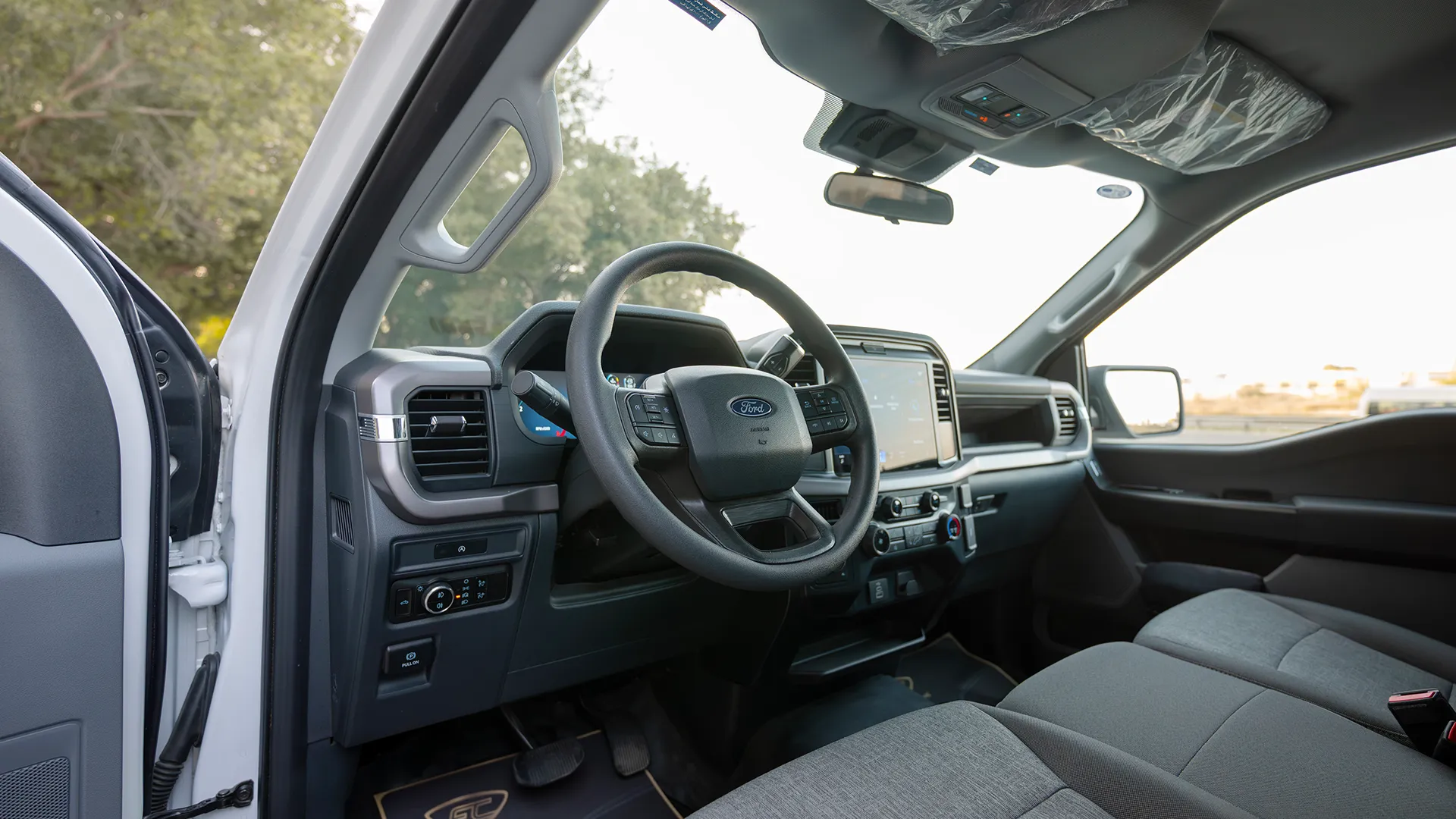 Used 2025 Ford F-150 XL in White – Driver Side Dashboard & Steering View