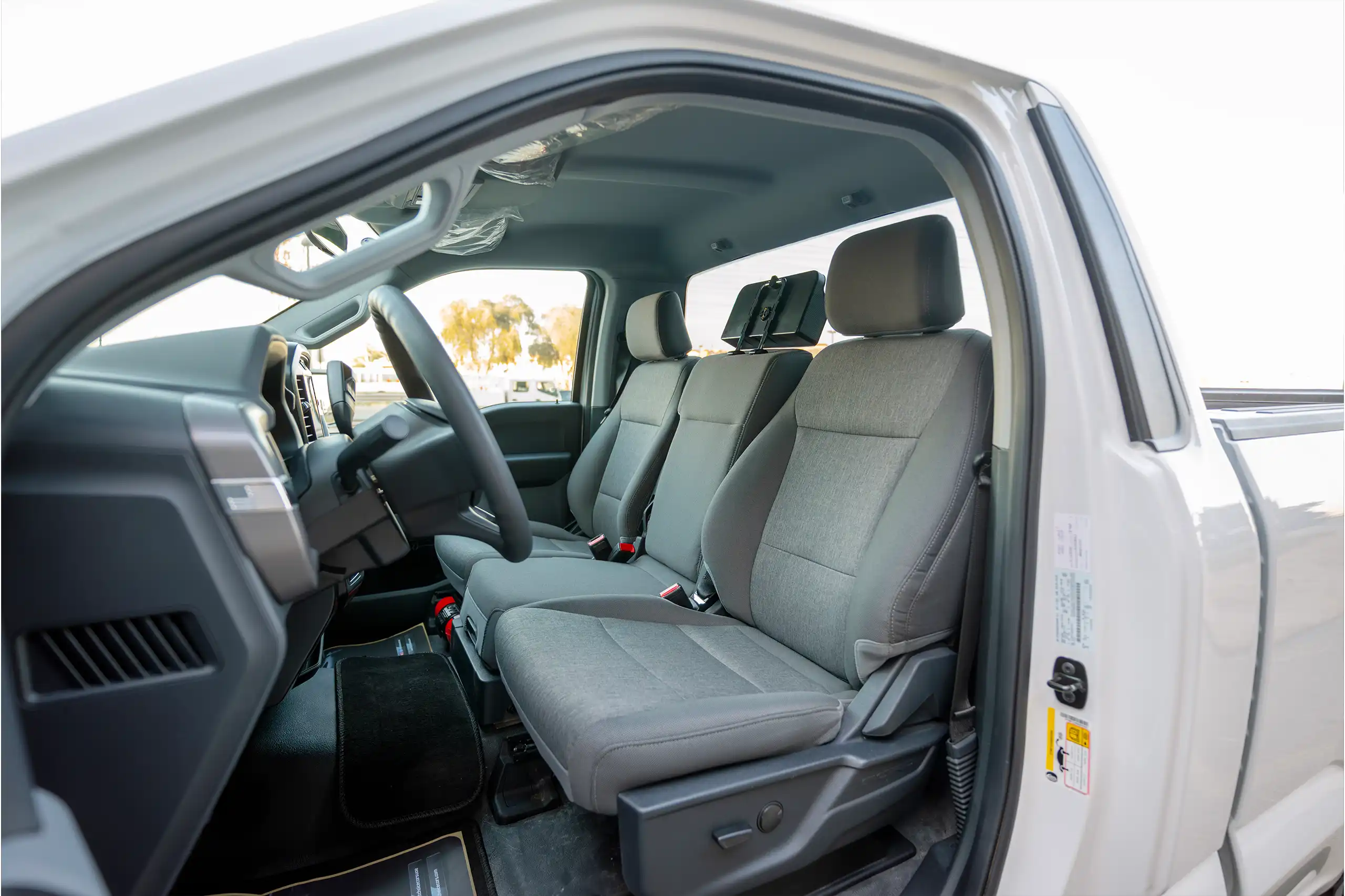 Used 2025 Ford F-Series Pickup F-150 XL in White – Front Driver Side Cabin View for Sale at First Choice Cars Dubai Sharjah
