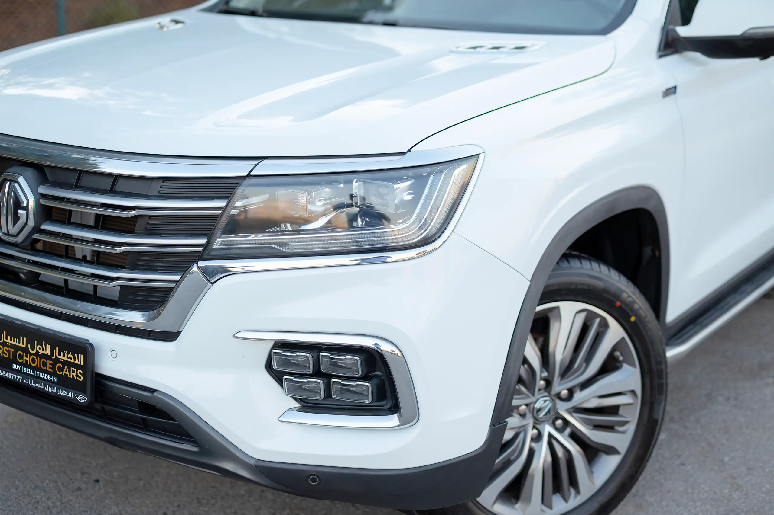 Used 2021 MG RX8 Luxury White – Headlight Close-up at First Choice Cars Sharjah