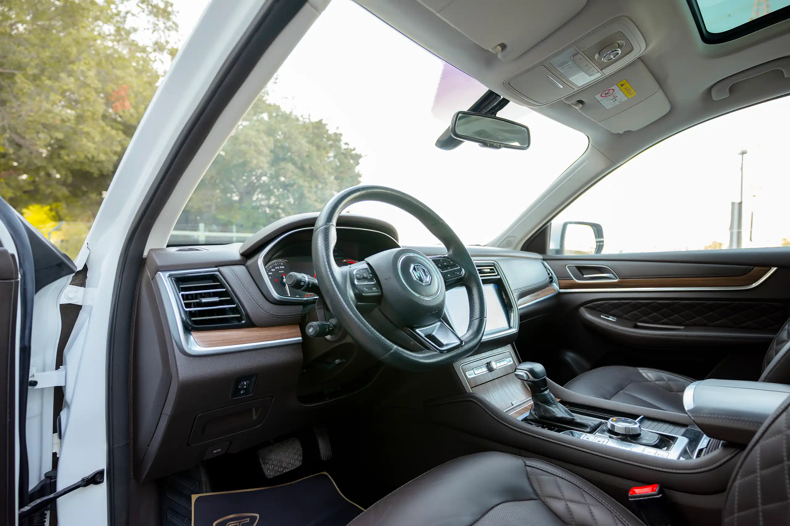 Used 2021 MG RX8 Luxury White – Driver Side Dashboard & Steering View at First Choice Cars Sharjah