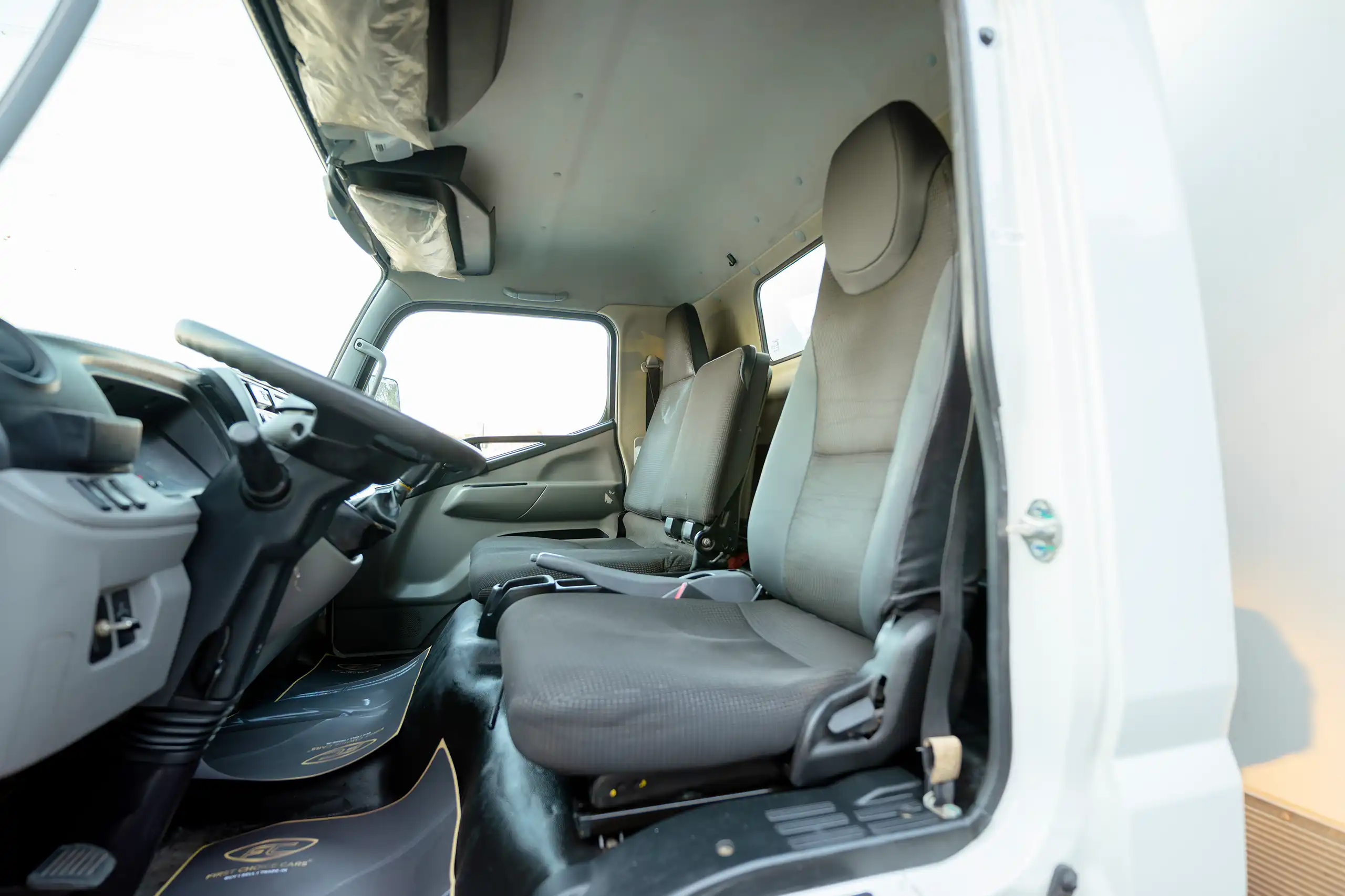 Used 2020 Mitsubishi Canter Chiller Box White – Front Driver Side Cabin View at First Choice Cars Sharjah