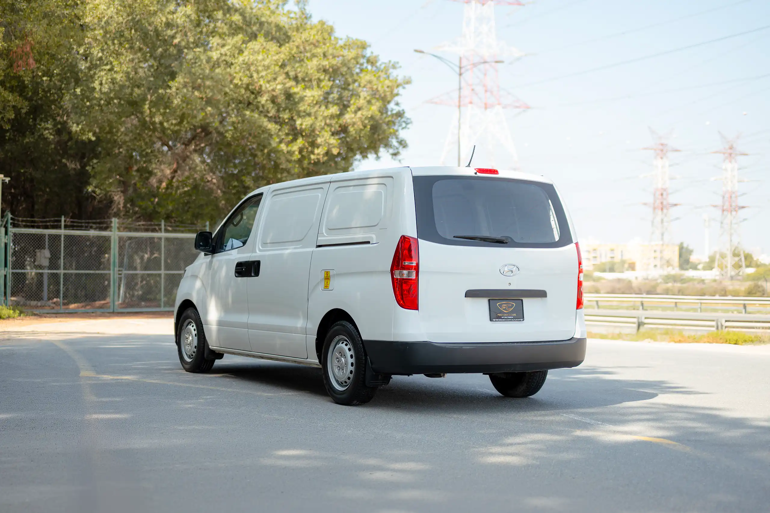 Used 2021 Hyundai H1 Cargo Van White – Left Back Diagonal (45°) View at First Choice Cars Sharjah