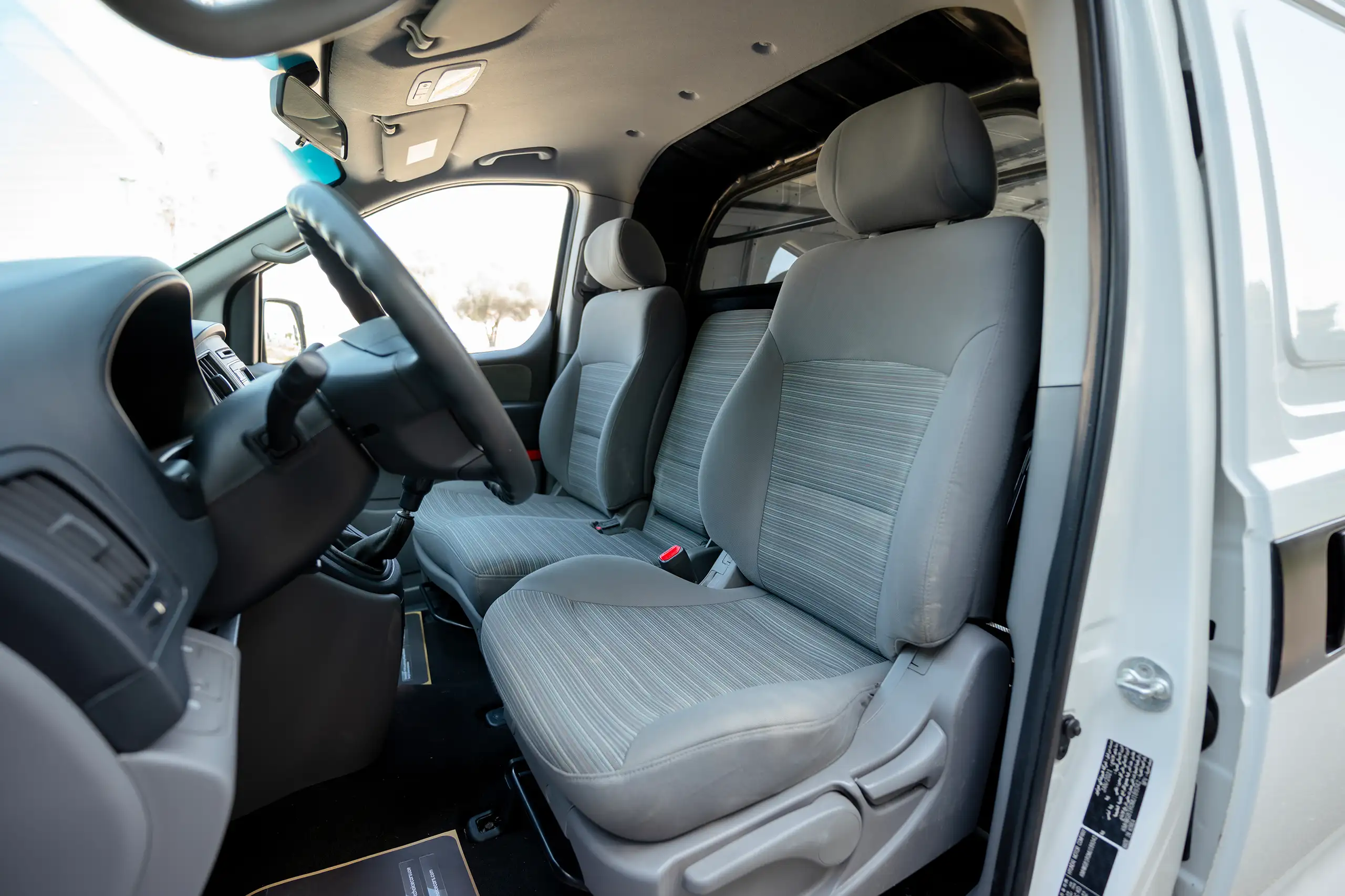 Used 2021 Hyundai H1 Cargo Van White – Front Driver Side Cabin View at First Choice Cars Sharjah