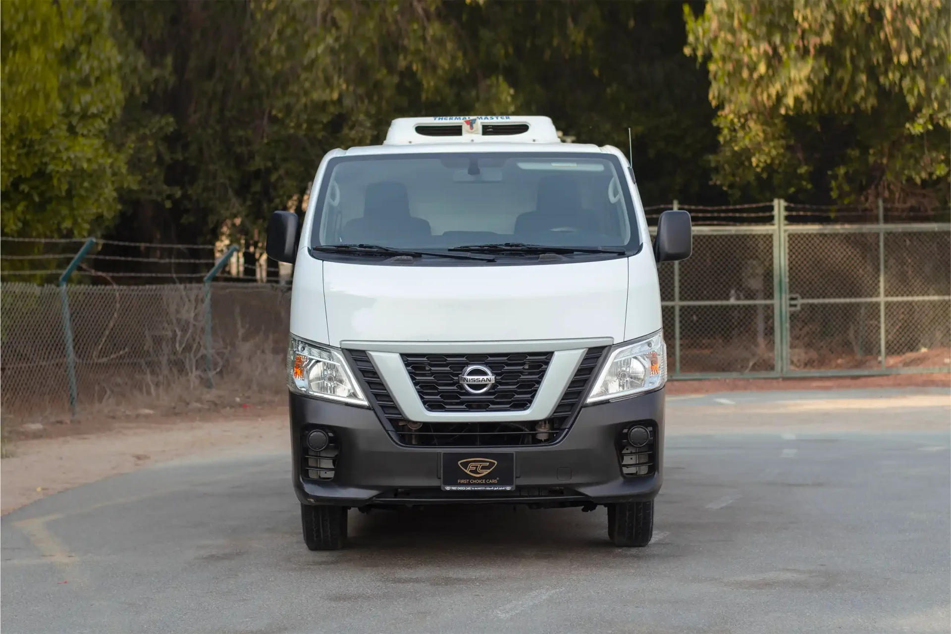 Used 2021 Nissan Urvan Standard Roof in White – Front View for Sale at First Choice Cars Dubai Sharjah