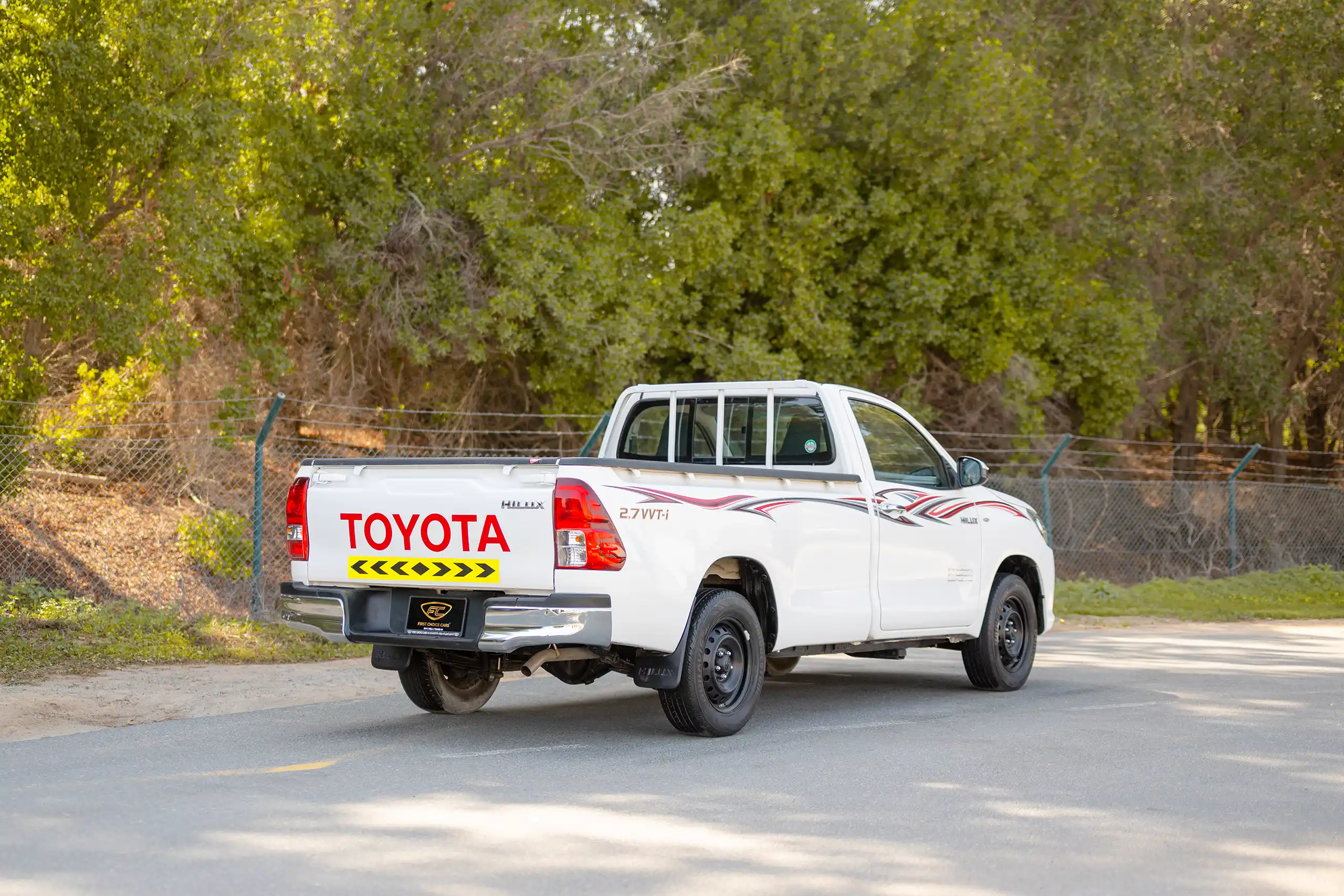 Used 2022 Toyota Hilux GLX Single Cabin White – Right Back Diagonal (45°) View at First Choice Cars Sharjah
