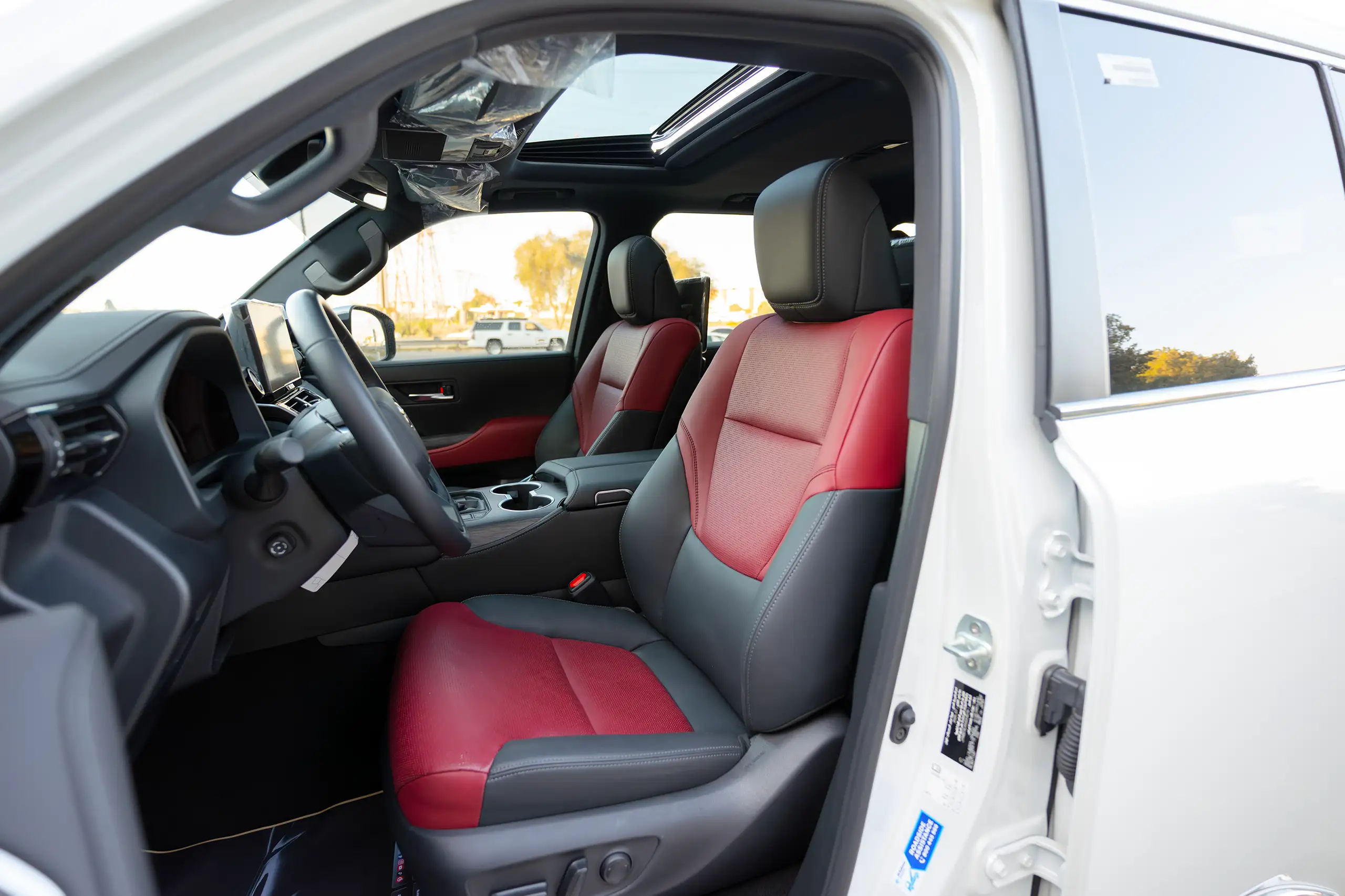 Used 2025 Toyota Land Cruiser VXR White – Front Driver Side Cabin View at First Choice Cars Sharjah