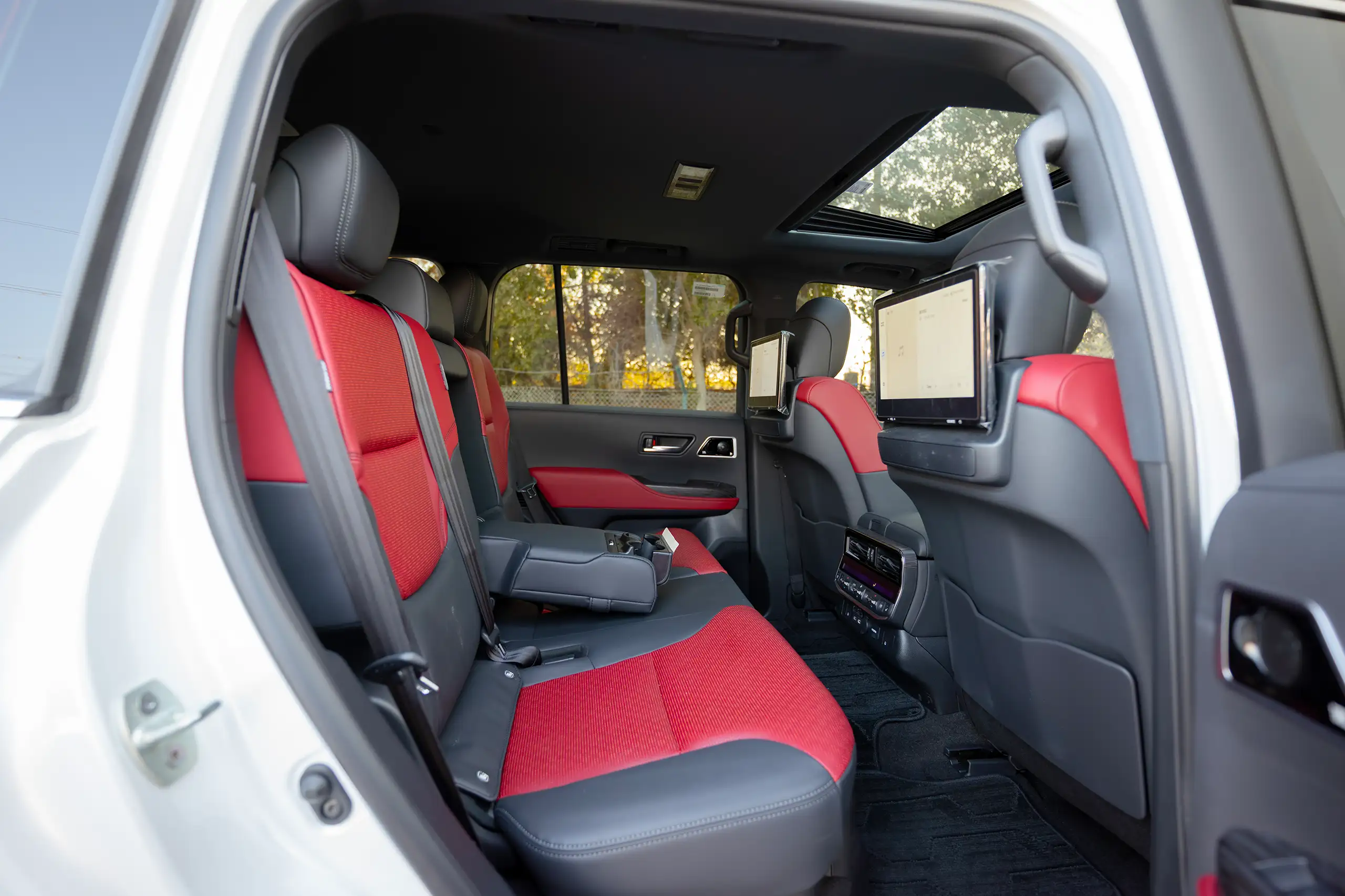 Used 2025 Toyota Land Cruiser VXR White – Rear Passenger Side Cabin View at First Choice Cars Sharjah