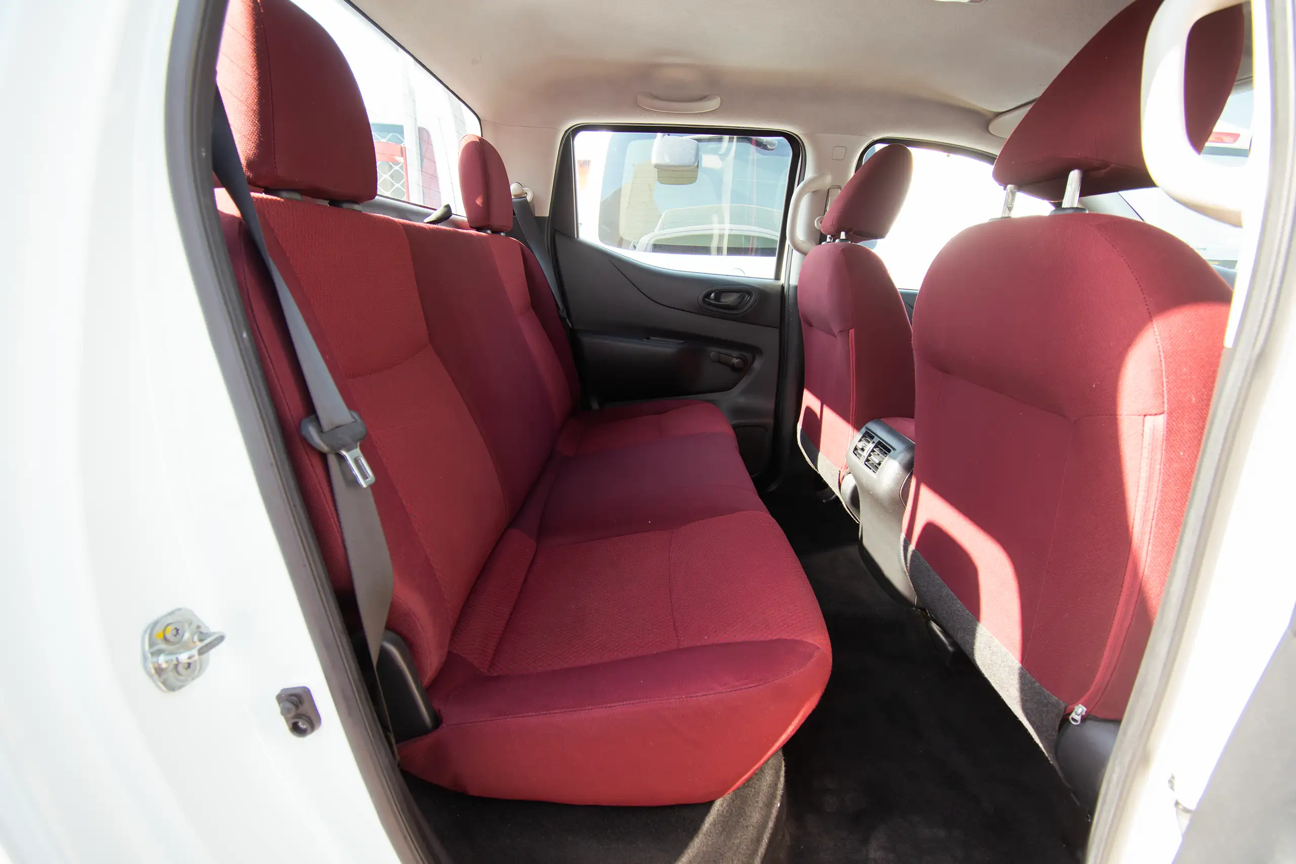 Used 2022 Nissan Navara SE White – Rear Passenger Side Cabin View at First Choice Cars Sharjah