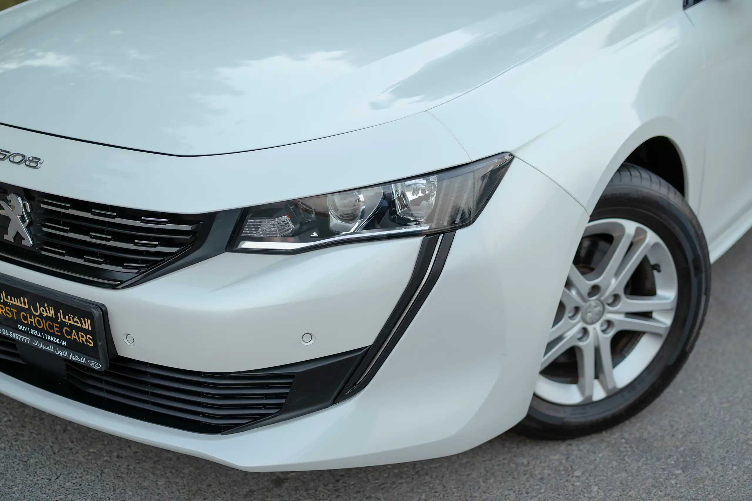 Used 2023 Peugeot 508 Allure in White – Headlight Close-up for Sale at First Choice Cars Dubai Sharjah