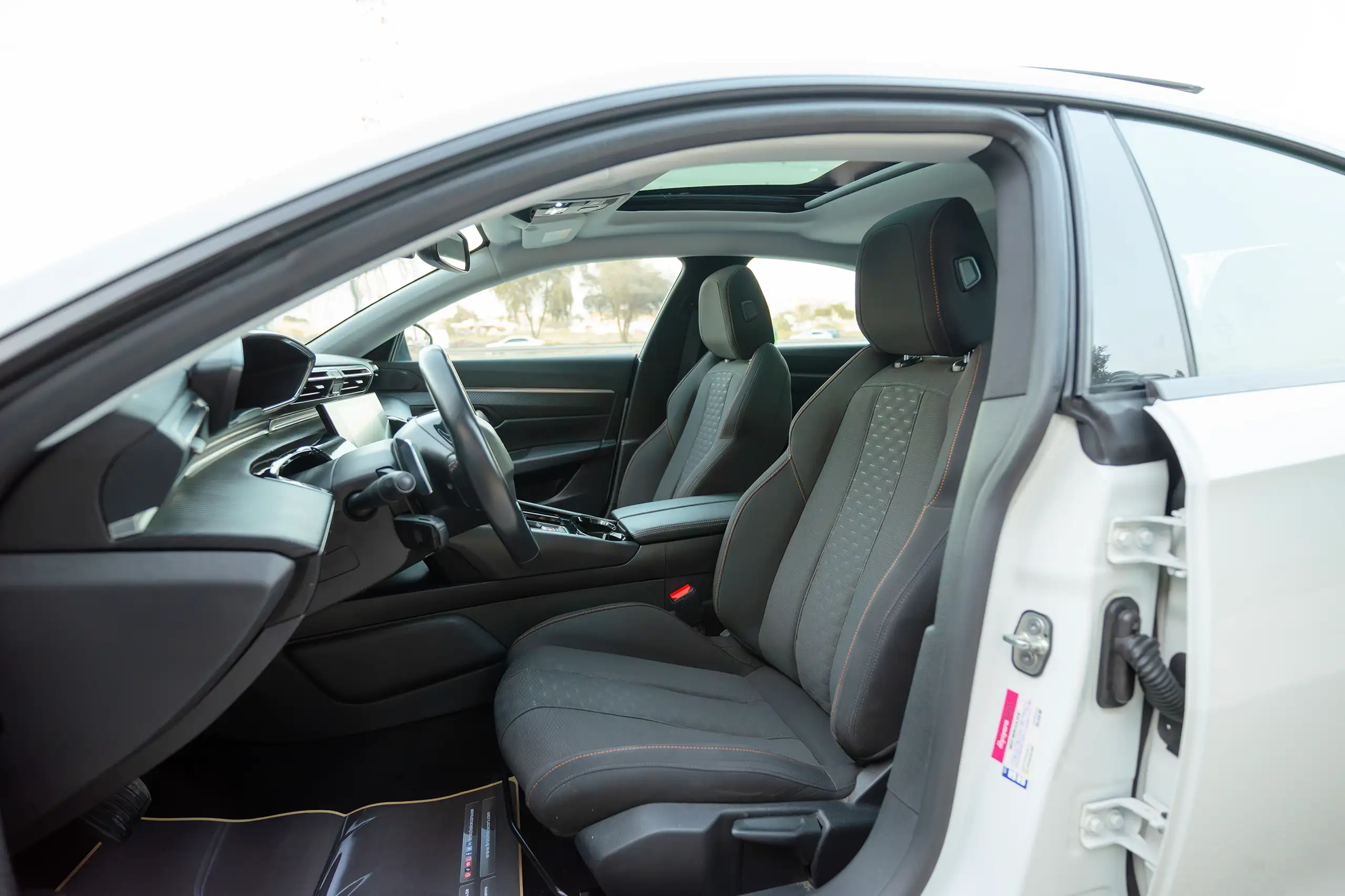 Used 2023 Peugeot 508 Allure in White – Front Driver Side Cabin View for Sale at First Choice Cars Dubai Sharjah