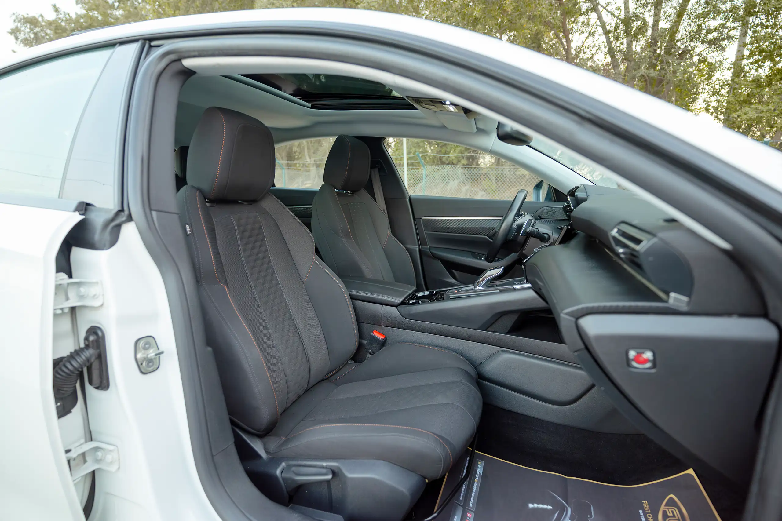 Used 2023 Peugeot 508 Allure in White – Front Passenger Side Cabin View for Sale at First Choice Cars Dubai Sharjah