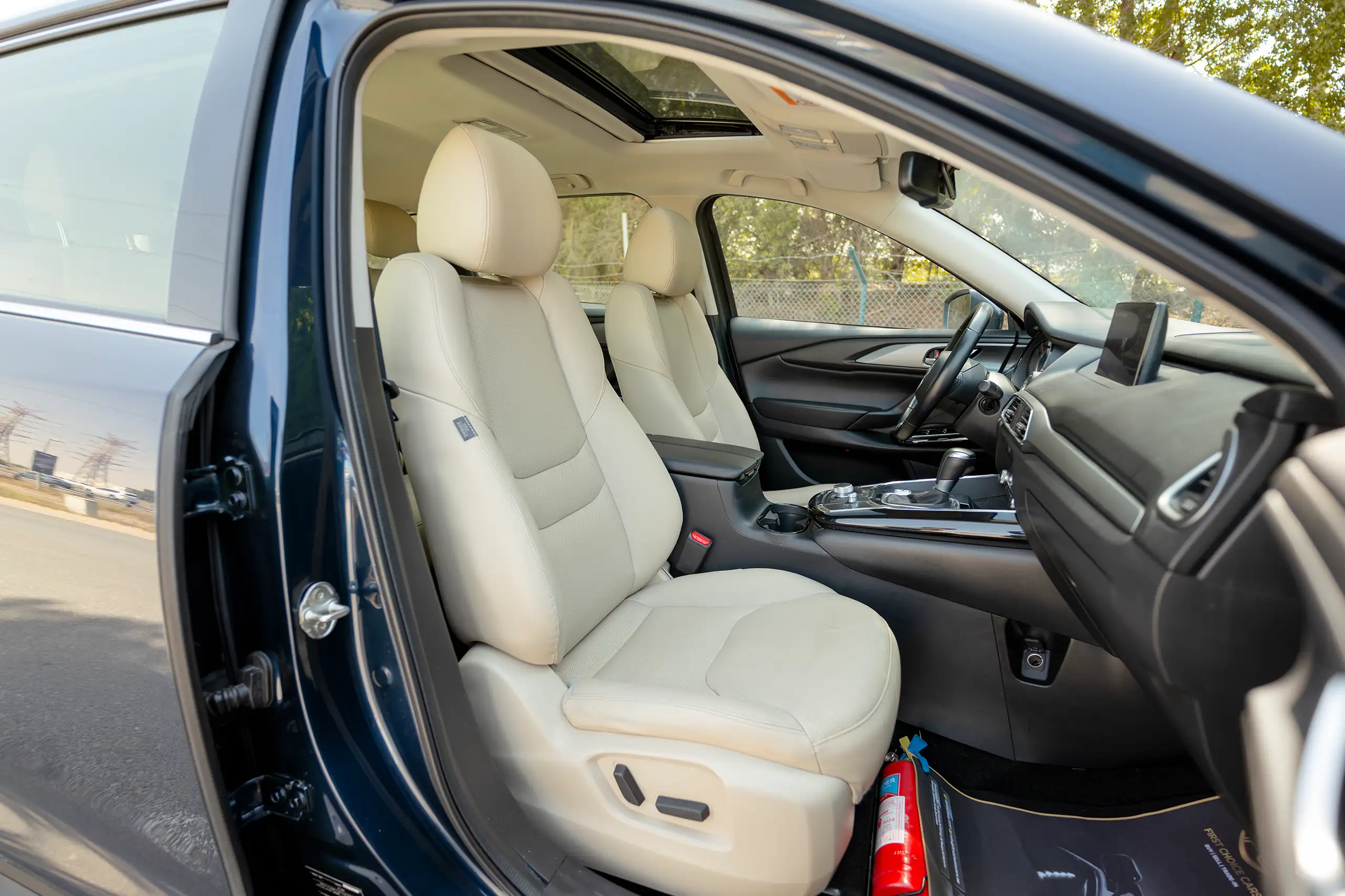 Used 2023 Mazda CX-9 GT in Blue – Front Passenger Side Cabin View for Sale at First Choice Cars Dubai Sharjah