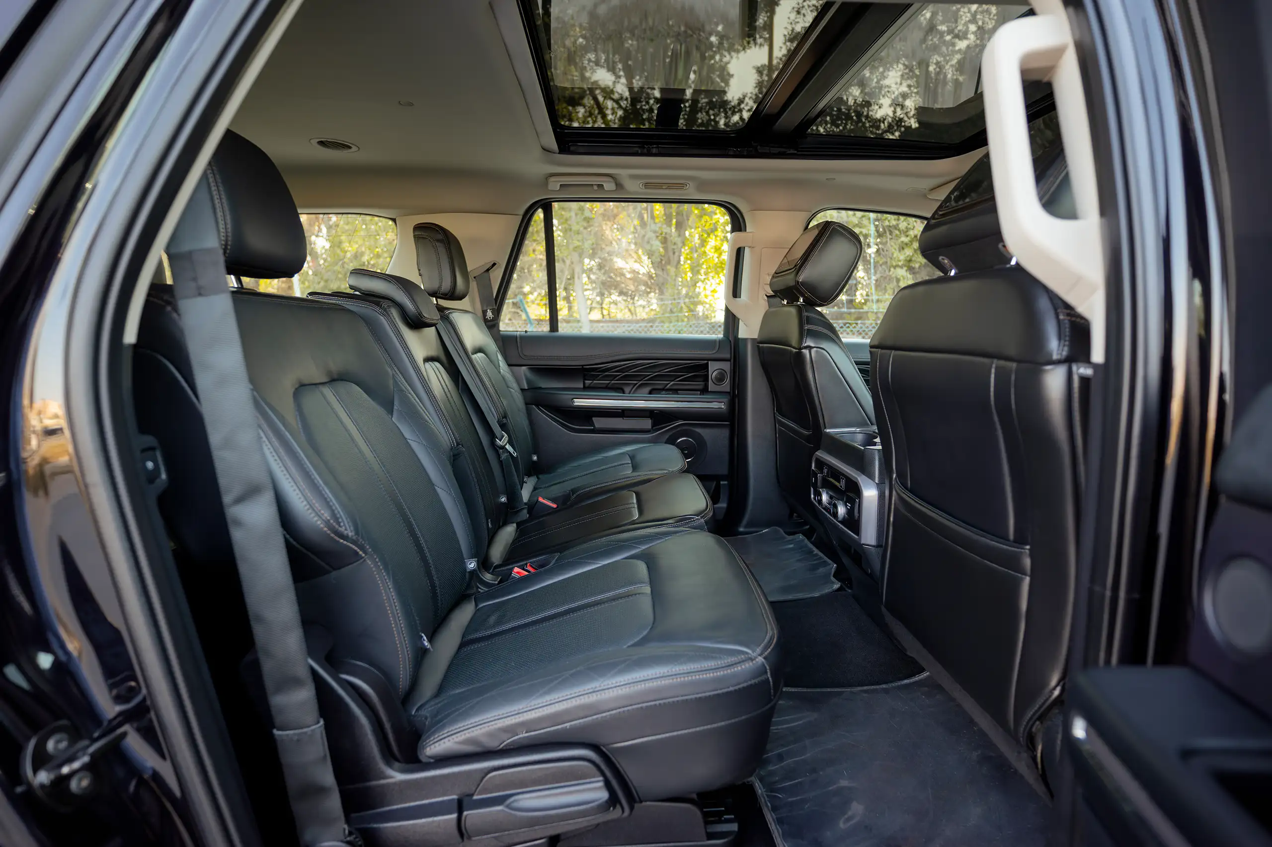 Used 2019 Ford Expedition Platinum in Black – Rear Passenger Side Cabin View for Sale at First Choice Cars Dubai Sharjah