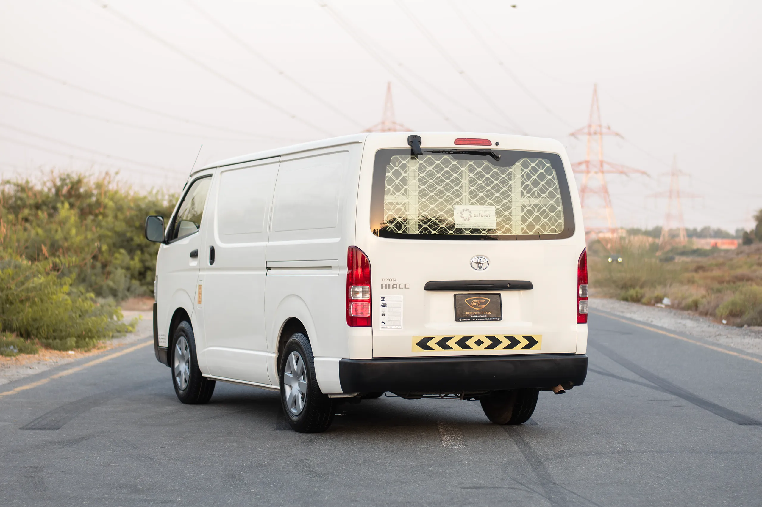 Used 2021 Toyota Hiace GL Standard Roof in White – Left Back Diagonal (45°) View for Sale at First Choice Cars Dubai Sharjah