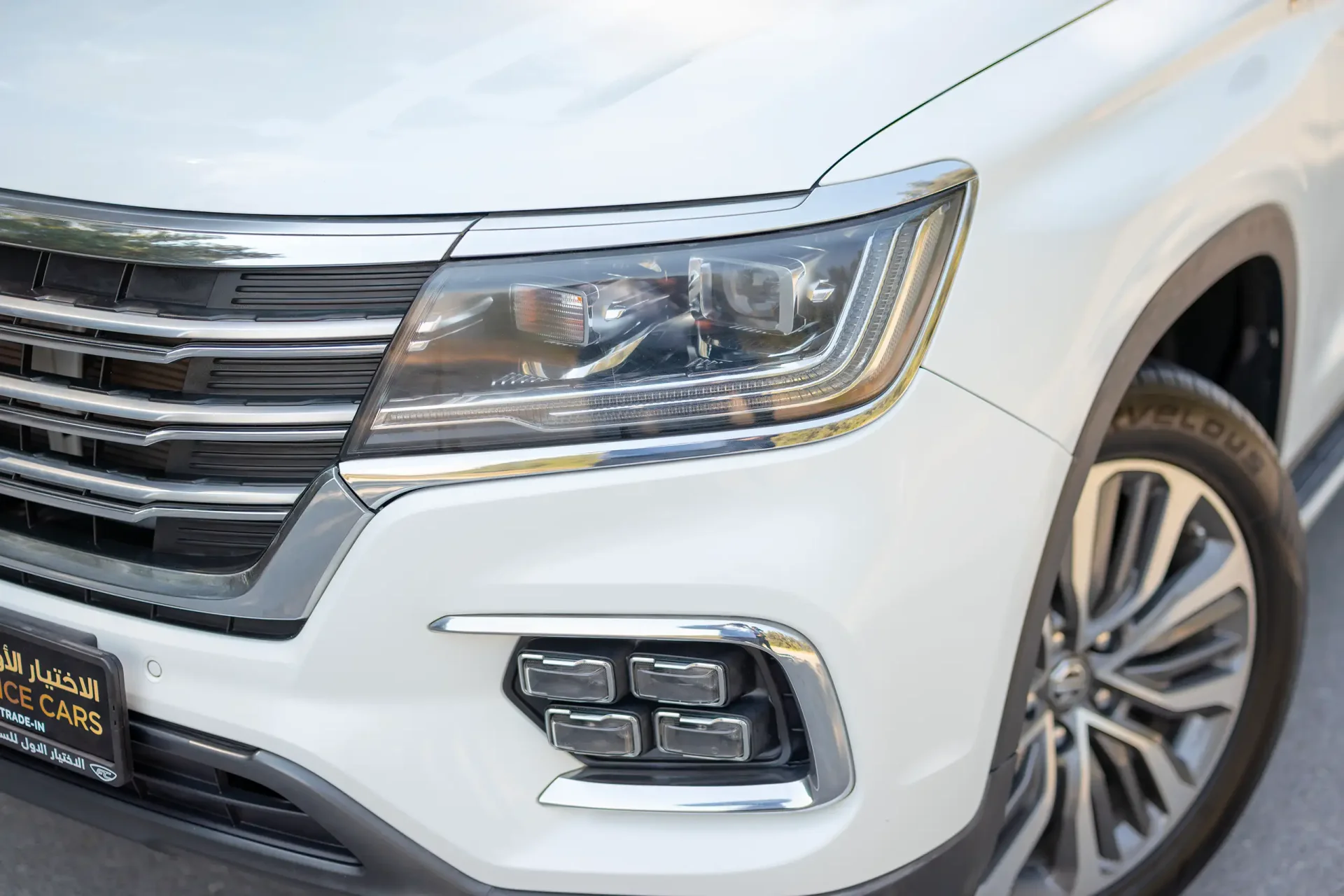 Used 2021 MG RX8 Luxury in White – Headlight Close-up for Sale at First Choice Cars Dubai Sharjah