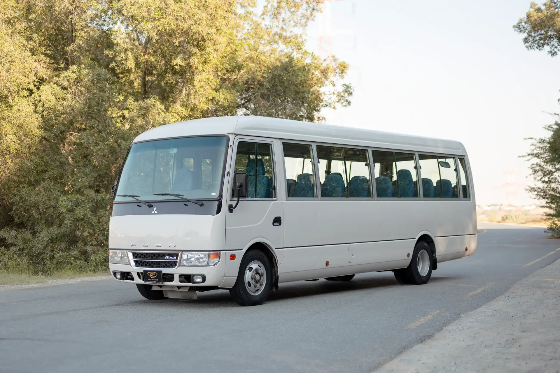 Used 2022 Mitsubishi ROSA Passenger Bus in White – Left Front Diagonal (45°) View for Sale at First Choice Cars Dubai Sharjah