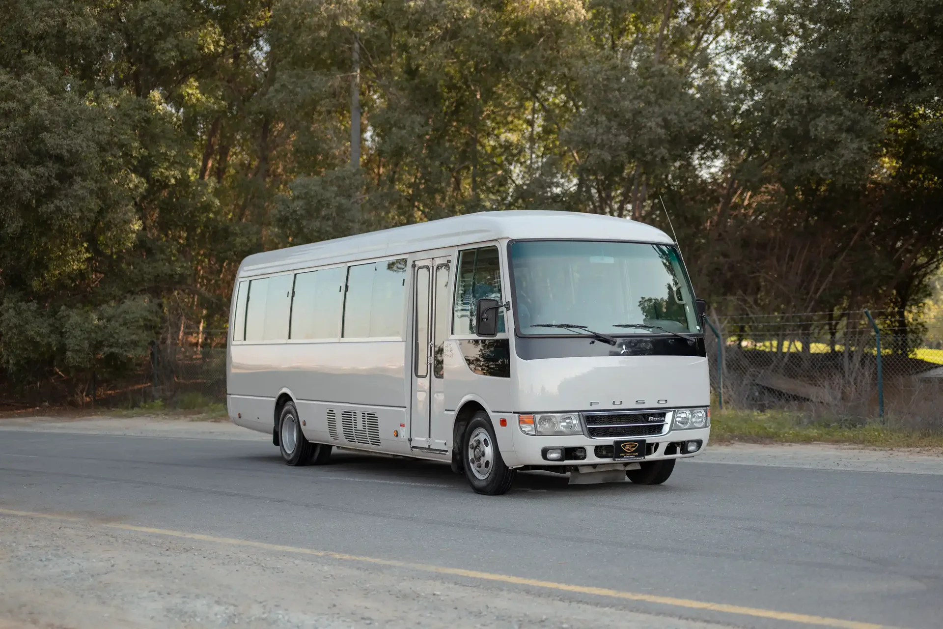Used 2022 Mitsubishi ROSA Passenger Bus in White – Right Front Diagonal (45°) View for Sale at First Choice Cars Dubai Sharjah