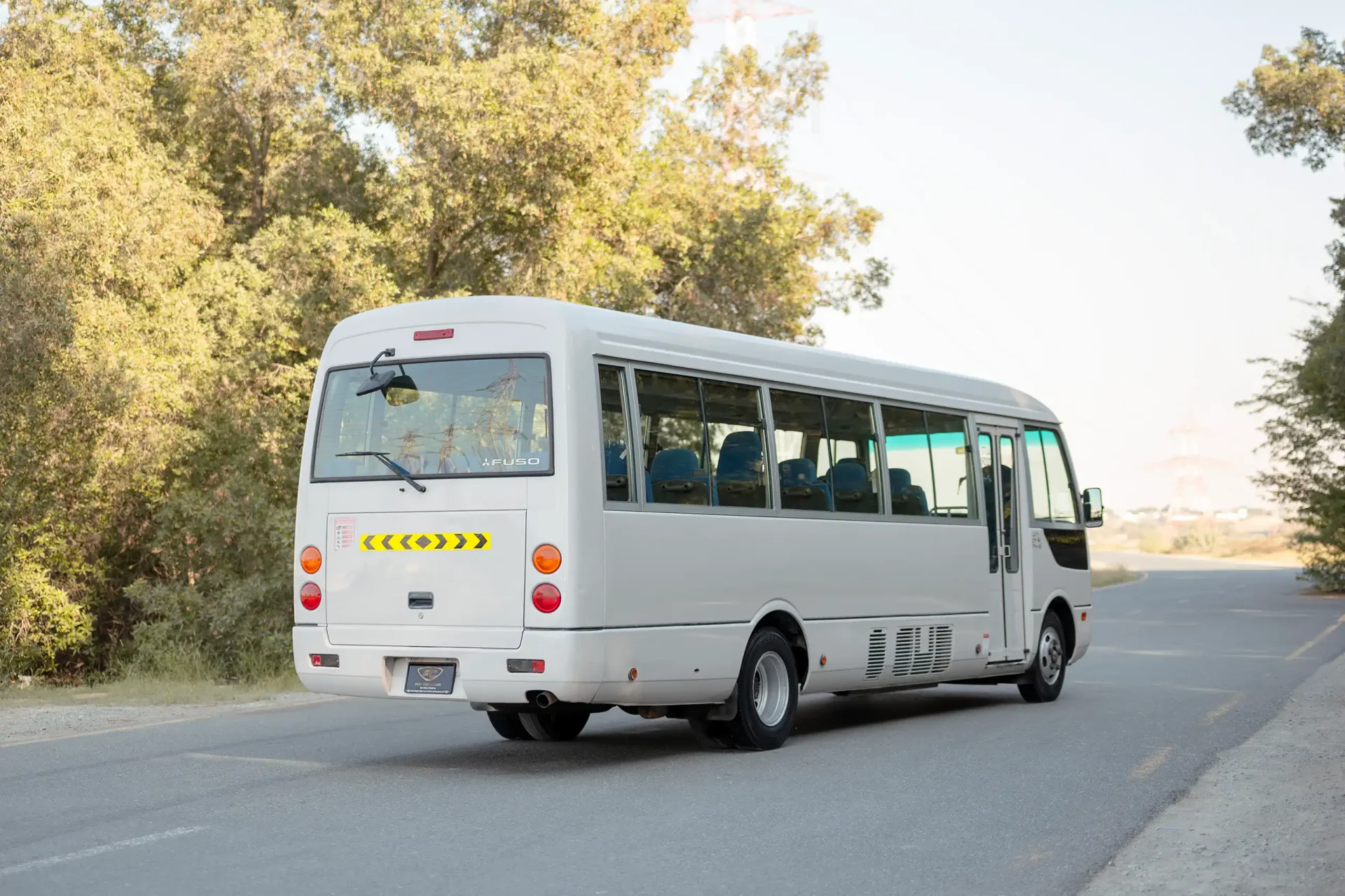 Used 2022 Mitsubishi ROSA Passenger Bus in White – Right Back Diagonal (45°) View for Sale at First Choice Cars Dubai Sharjah