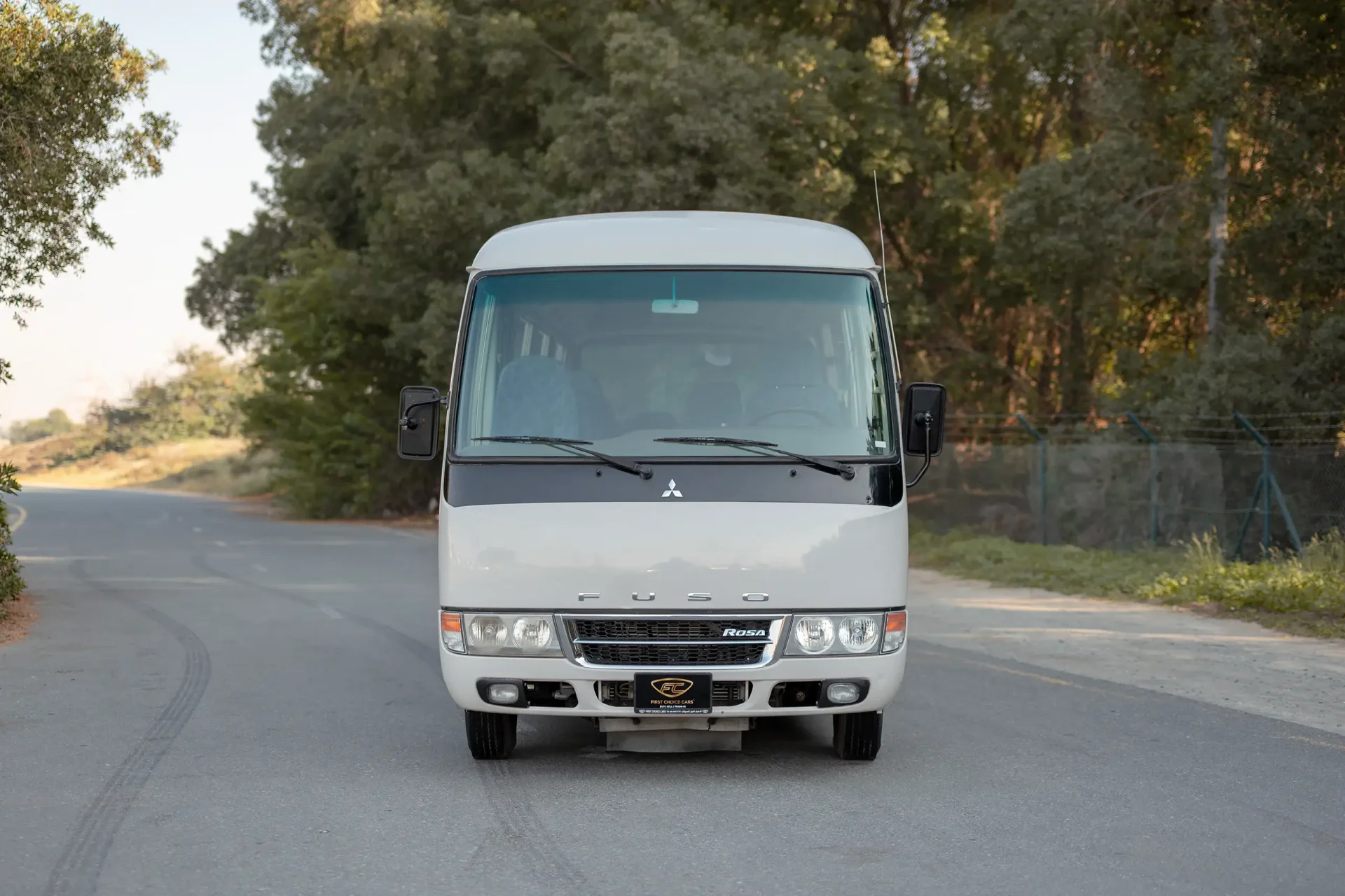 Used 2022 Mitsubishi ROSA Passenger Bus in White – Front View for Sale at First Choice Cars Dubai Sharjah