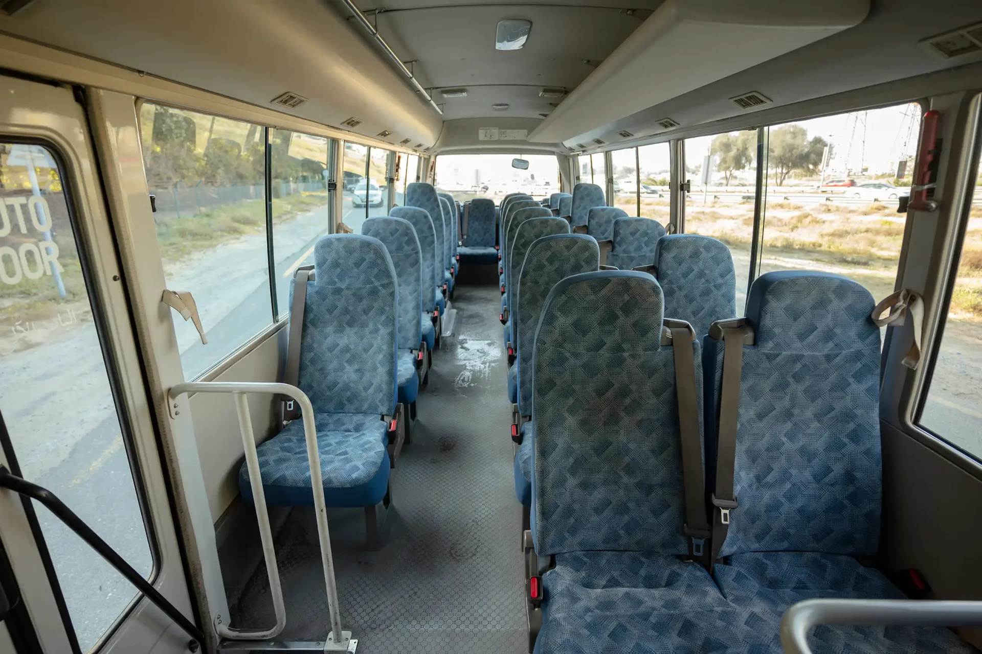 Used 2022 Mitsubishi ROSA Passenger Bus in White – Rear Seat View for Sale at First Choice Cars Dubai Sharjah