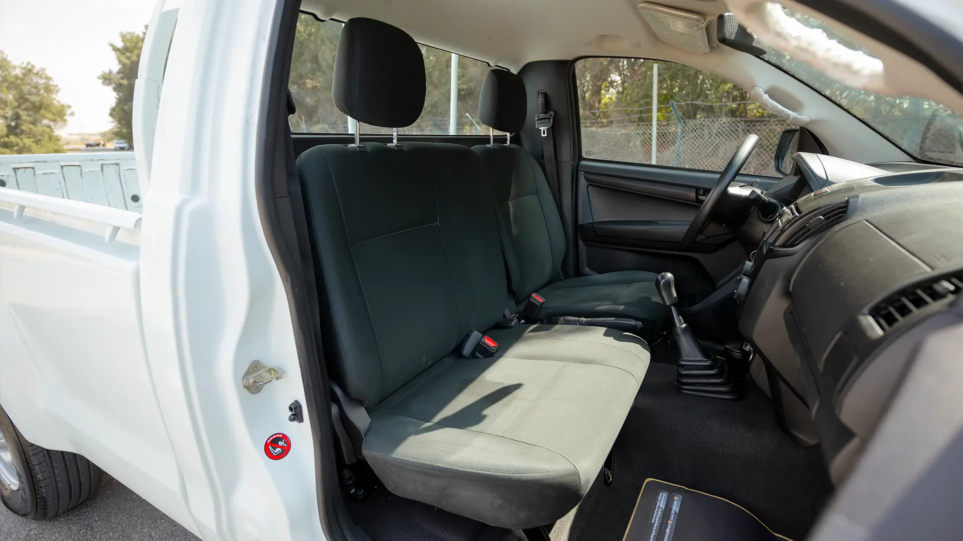 Used 2024 Isuzu D-MAX Single Cabin in White – Front Passenger Side Cabin View for Sale at First Choice Cars Dubai Sharjah