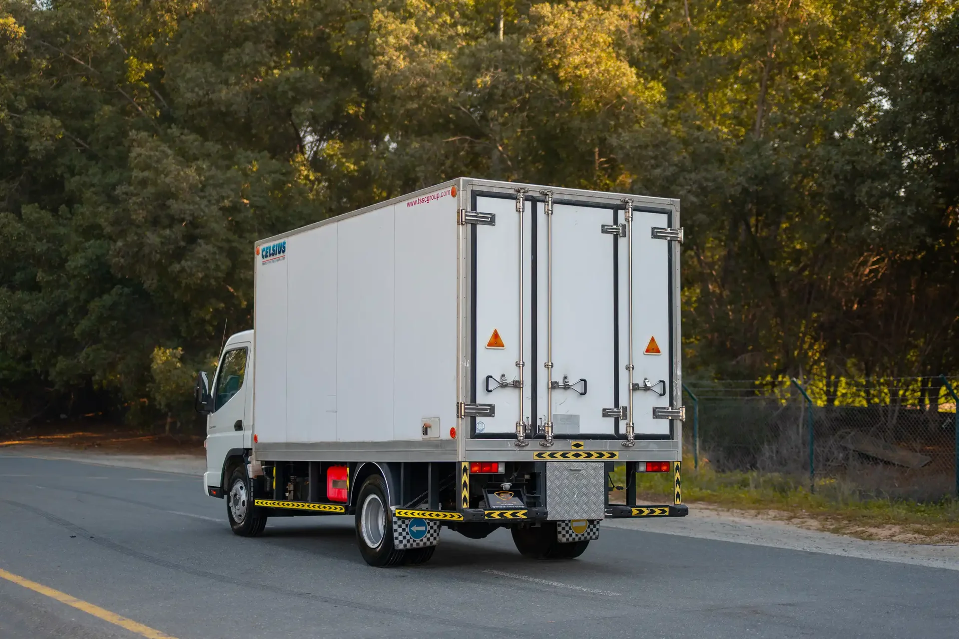 Used 2016 Mitsubishi Canter Freezer Box in White – Left Back Diagonal (45°) View for Sale at First Choice Cars Dubai Sharjah