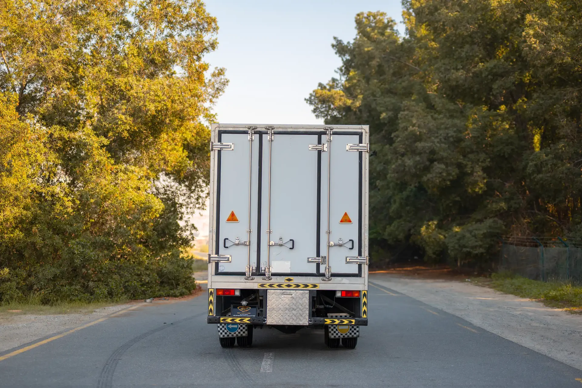 Used 2016 Mitsubishi Canter Freezer Box in White – Back/Rear View for Sale at First Choice Cars Dubai Sharjah