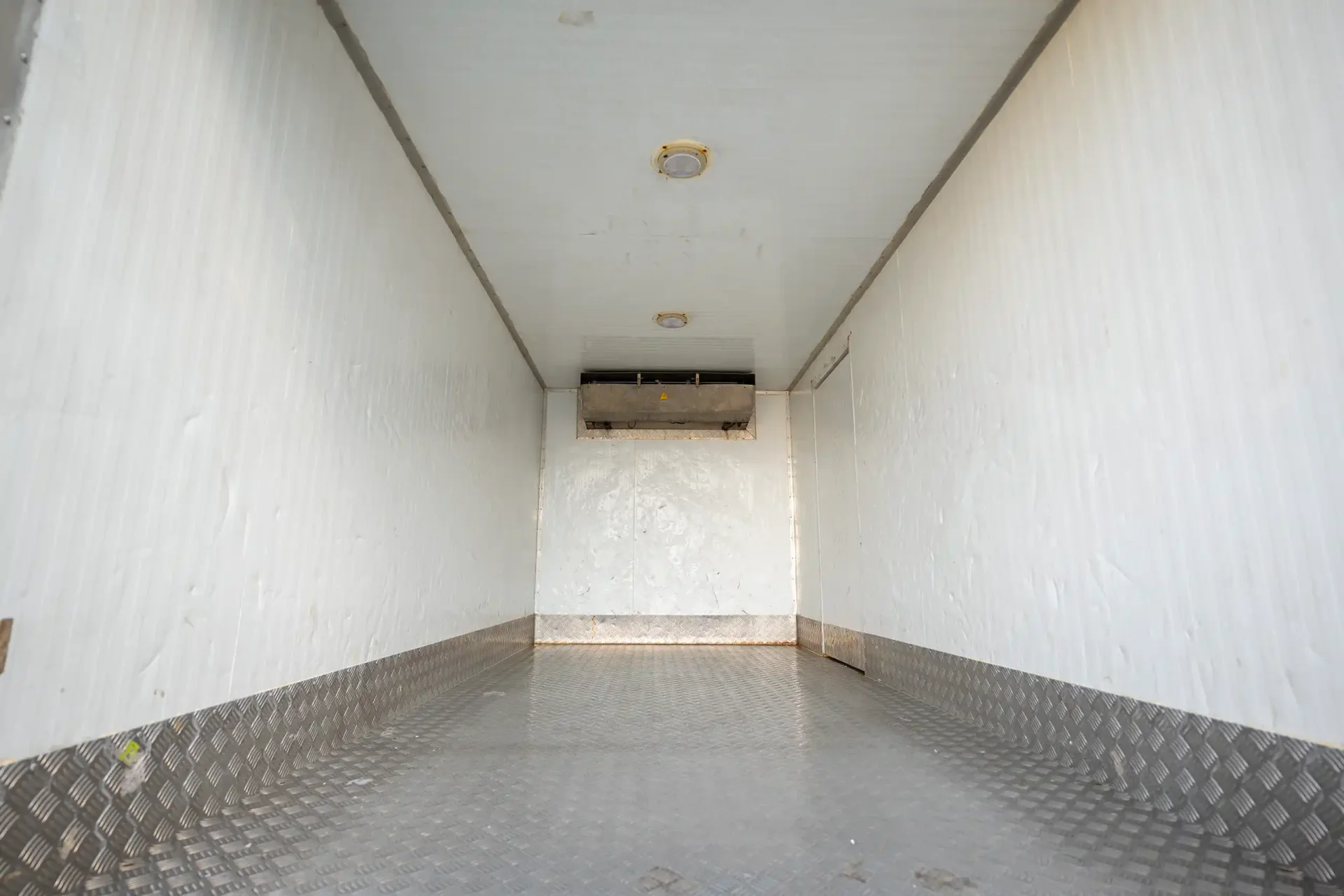 Used 2016 Mitsubishi Canter Freezer Box in White – Chiller Box Rear Opening View for Sale at First Choice Cars Dubai Sharjah