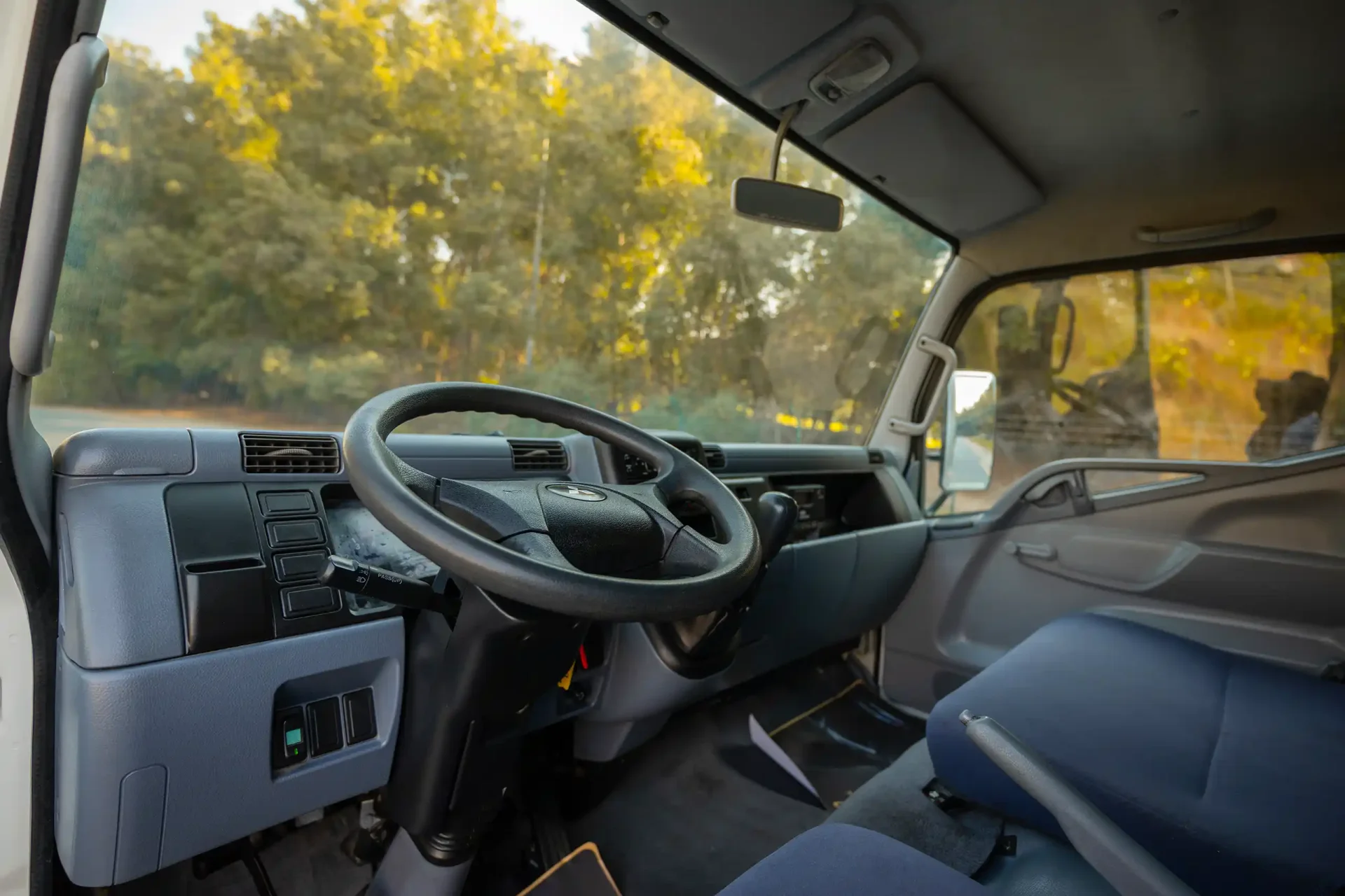 Used 2016 Mitsubishi Canter Freezer Box in White – Driver Side Dashboard & Steering View for Sale at First Choice Cars Dubai Sharjah