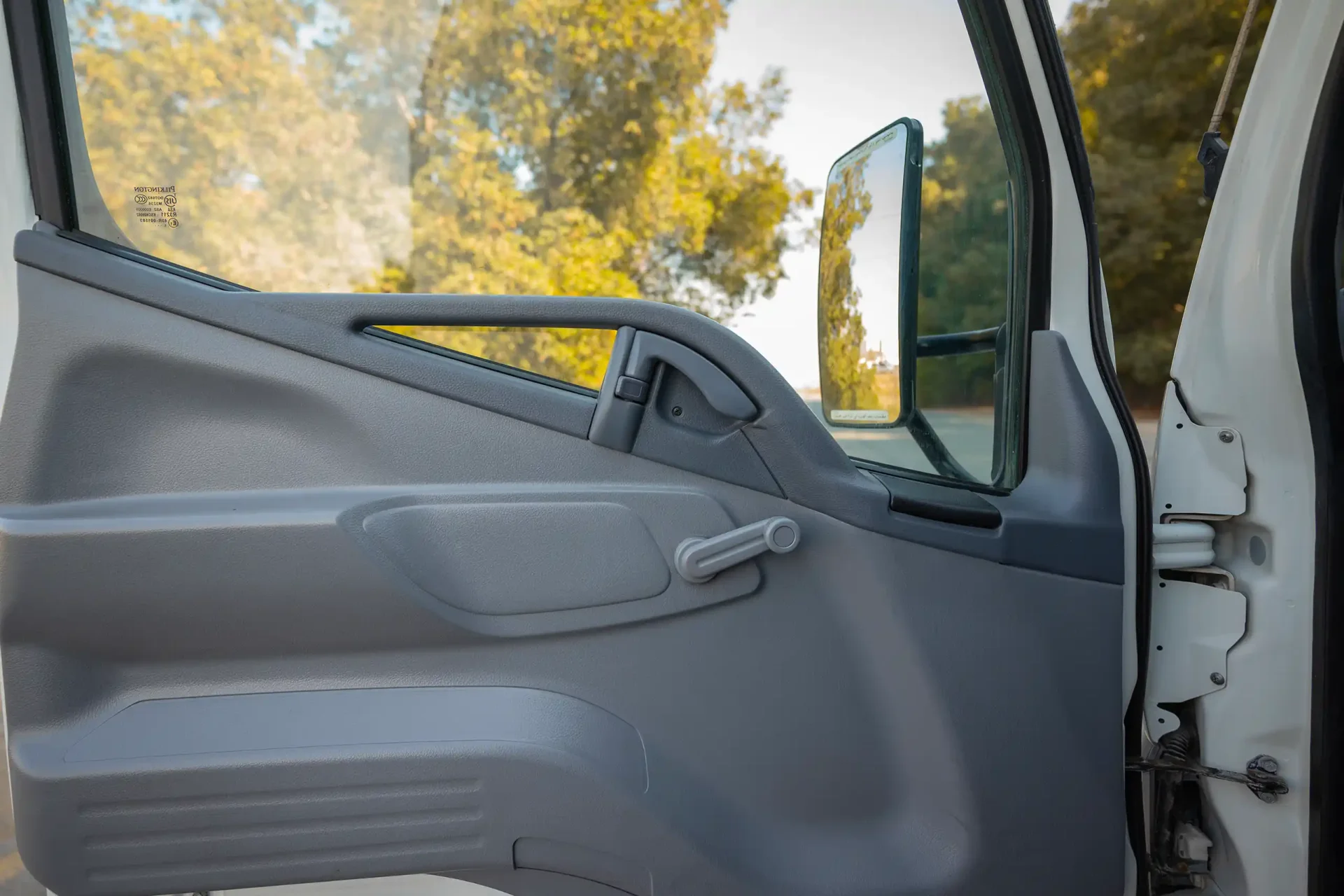 Used 2016 Mitsubishi Canter Freezer Box in White – Driver Door Panel Full View for Sale at First Choice Cars Dubai Sharjah