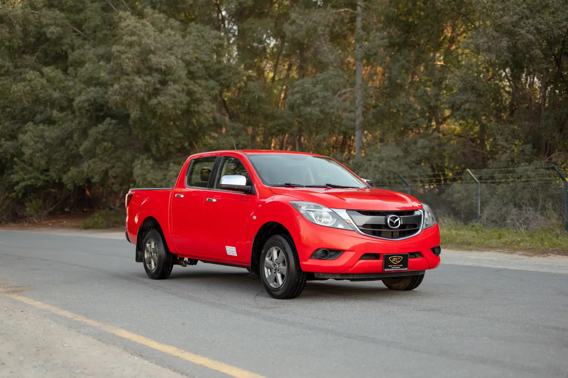 Used 2019 Mazda BT-50 XS in Red – Right Front Diagonal (45°) View for Sale at First Choice Cars Dubai Sharjah