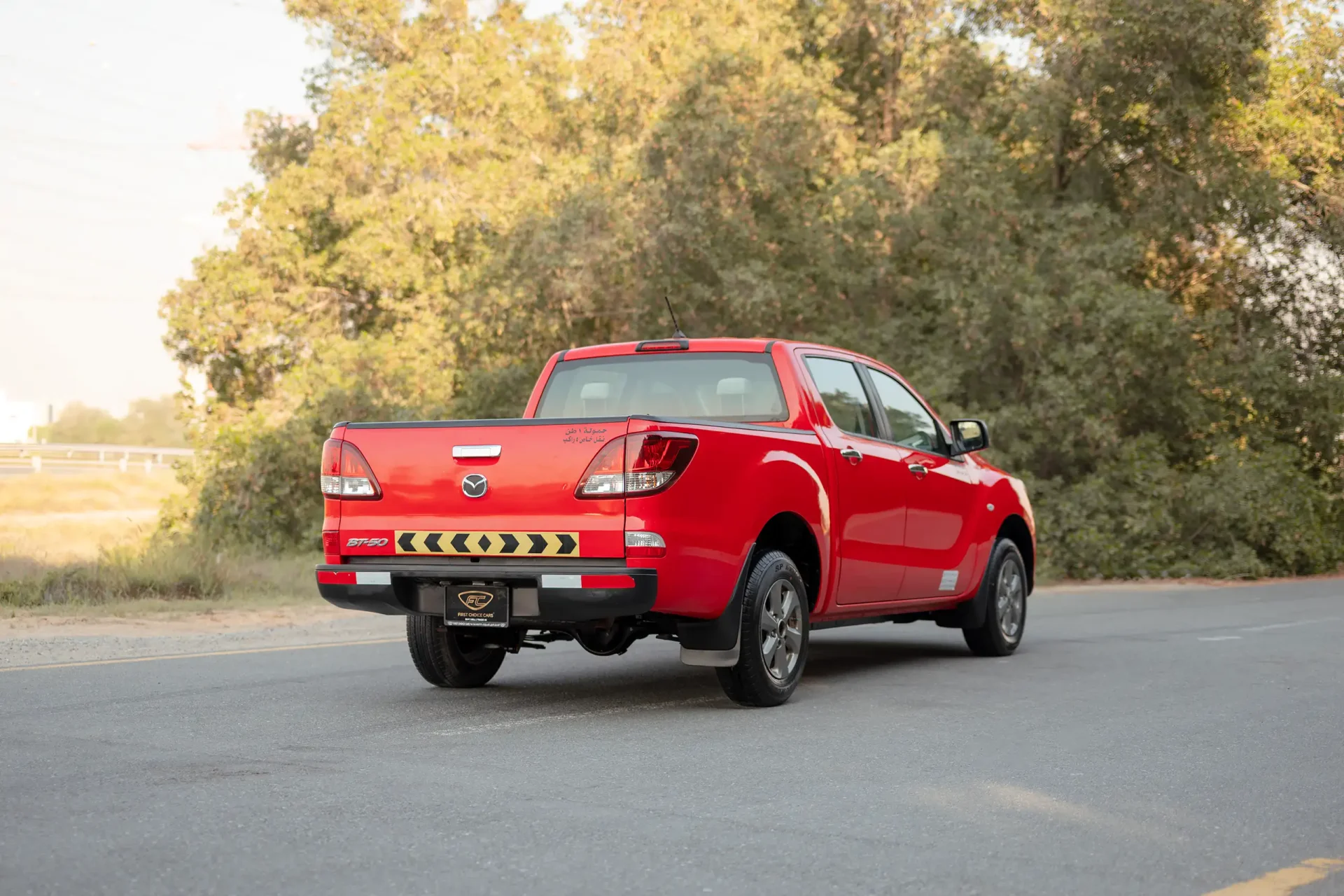 Used 2019 Mazda BT-50 XS in Red – Right Back Diagonal (45°) View for Sale at First Choice Cars Dubai Sharjah