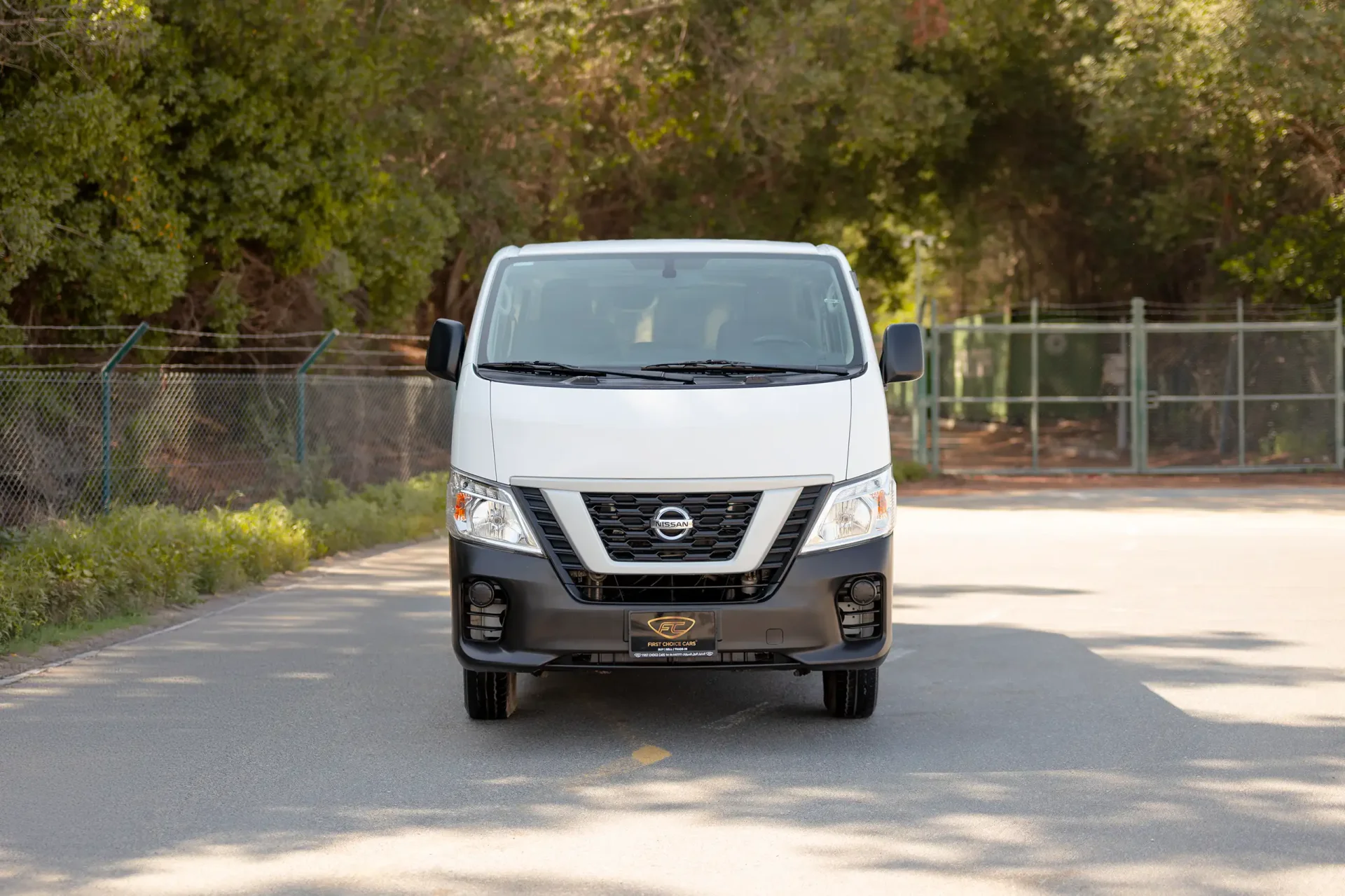 Used 2022 Nissan Urvan Standard Roof in White – Front View for Sale at First Choice Cars Dubai Sharjah