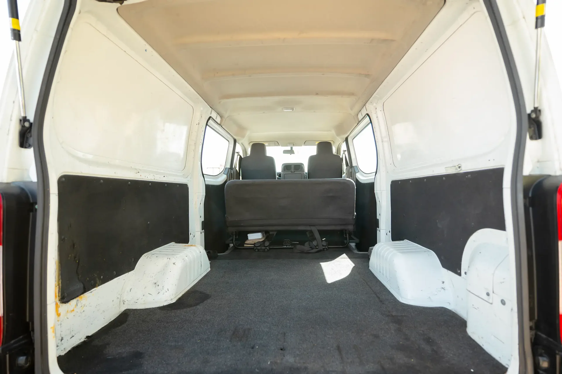 Used 2022 Nissan Urvan Standard Roof in White – Delivery Box Rear Opening View for Sale at First Choice Cars Dubai Sharjah