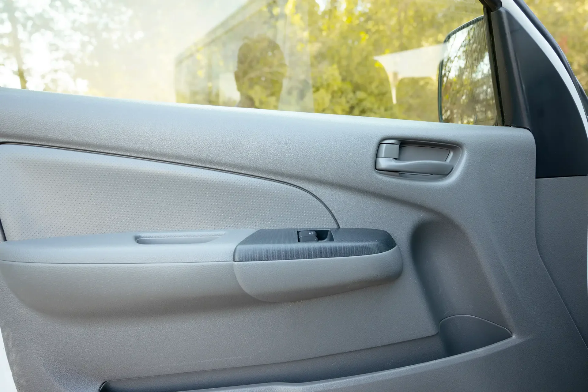 Used 2022 Nissan Urvan Standard Roof in White – Driver Door Panel Full View for Sale at First Choice Cars Dubai Sharjah