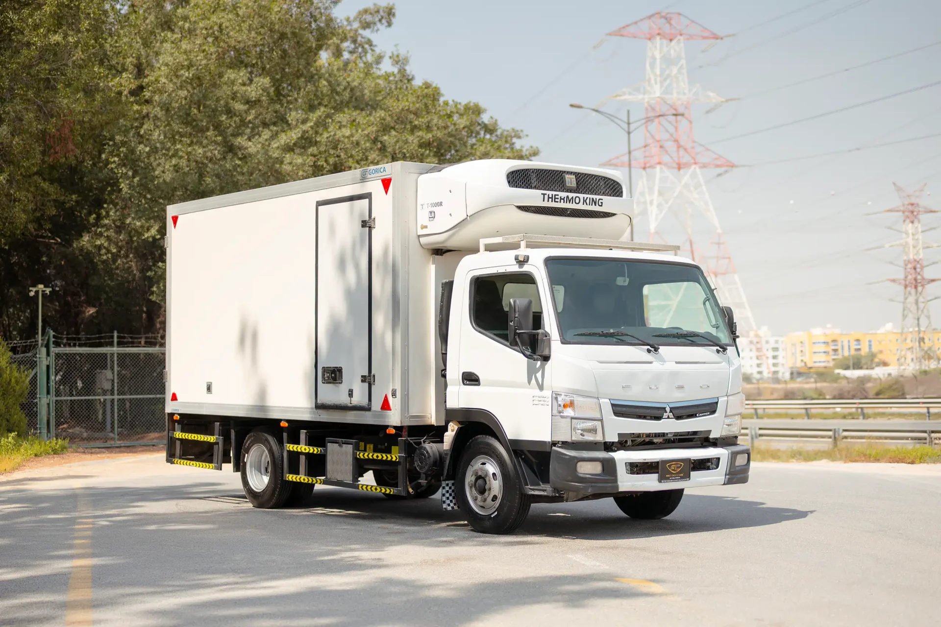 Used 2020 Mitsubishi Canter Freezer Box in White – Right Front Diagonal (45°) View for Sale at First Choice Cars Dubai Sharjah