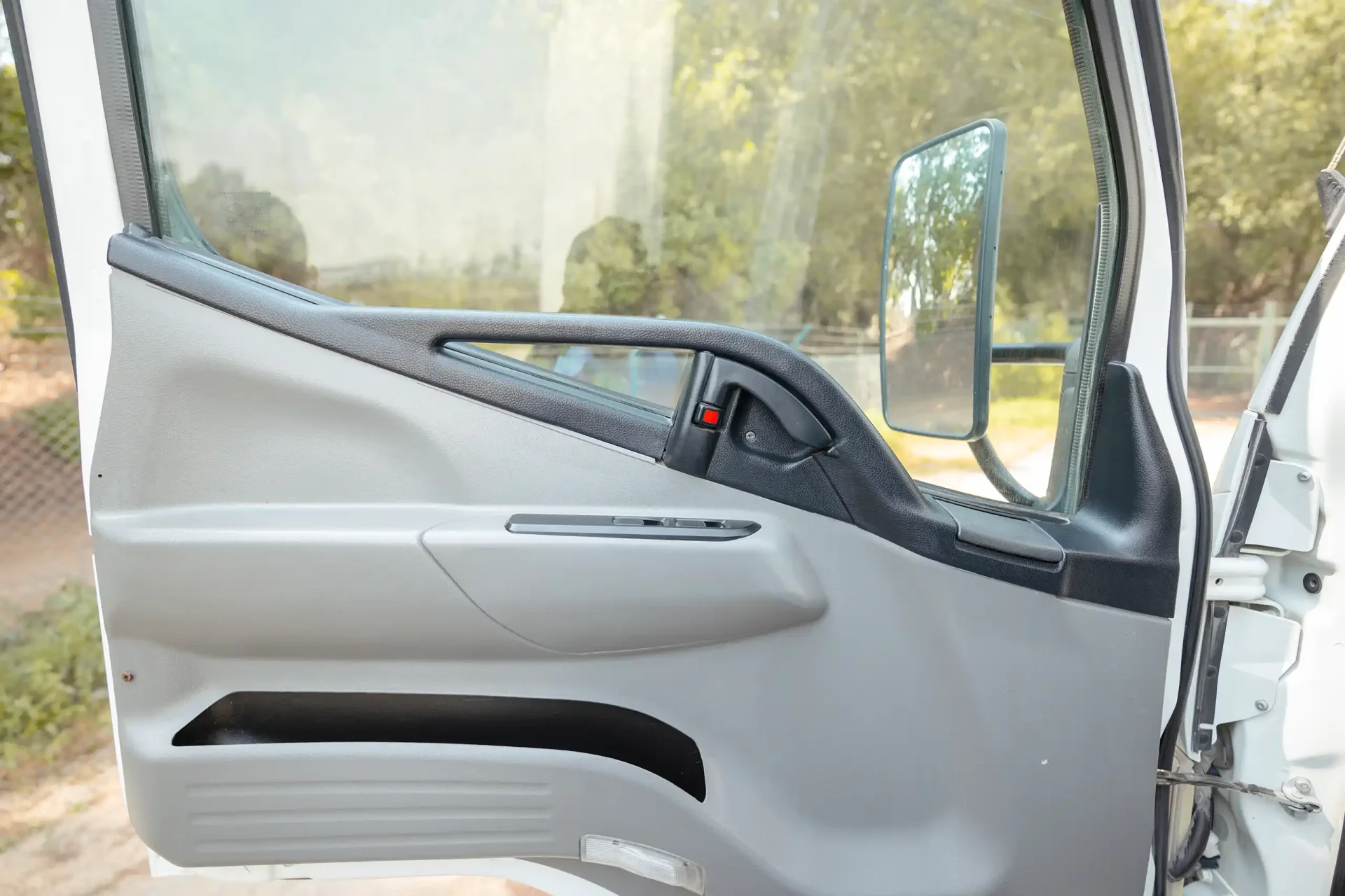 Used 2020 Mitsubishi Canter Freezer Box in White – Driver Door Panel Full View for Sale at First Choice Cars Dubai Sharjah