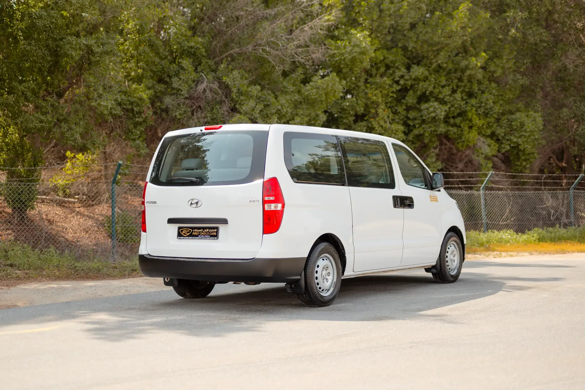Used 2021 Hyundai H1 12-Seater Wagon in White – Right Back Diagonal (45°) View for Sale at First Choice Cars Dubai Sharjah
