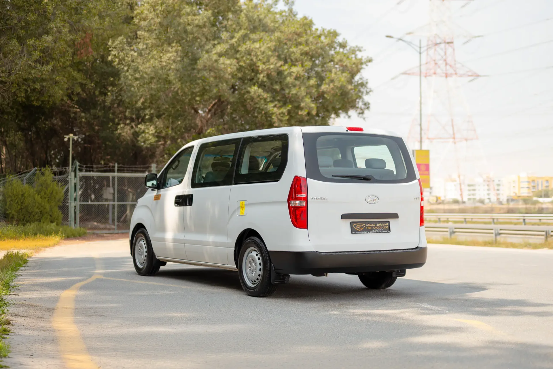Used 2021 Hyundai H1 12-Seater Wagon in White – Left Back Diagonal (45°) View for Sale at First Choice Cars Dubai Sharjah