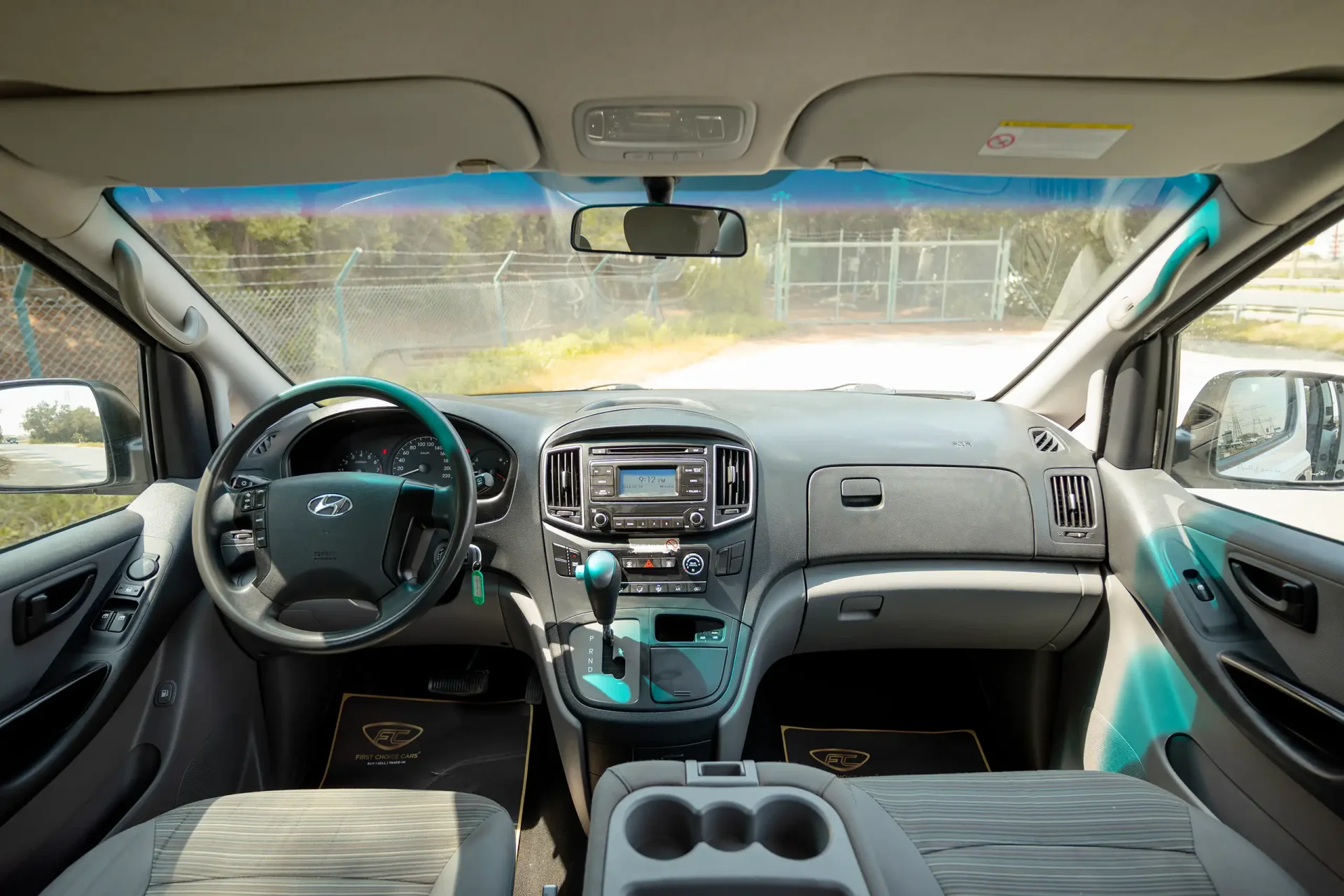 Used 2021 Hyundai H1 12-Seater Wagon in White – Front Cabin / Dashboard Full View for Sale at First Choice Cars Dubai Sharjah