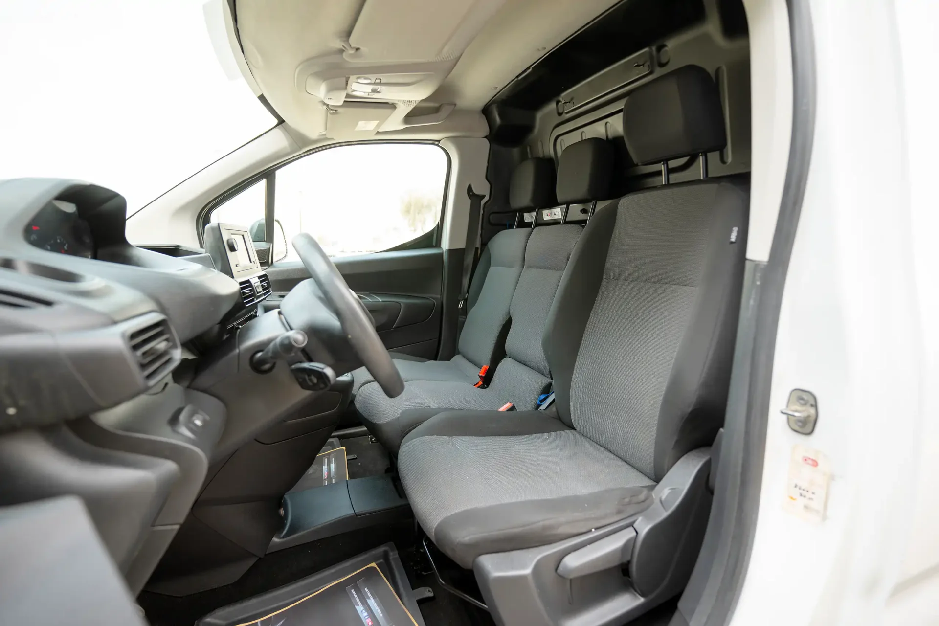 Used 2022 Peugeot Partner Standard in White – Front Driver Side Cabin View for Sale at First Choice Cars Dubai Sharjah