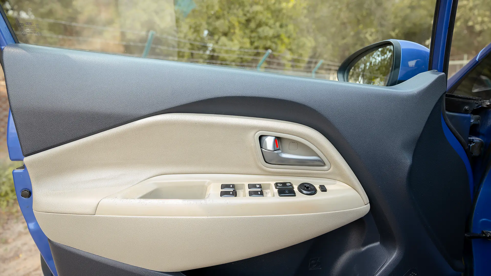 Used 2015 Kia Rio EX in Blue – Driver Door Panel Full View for Sale at First Choice Cars Dubai Sharjah