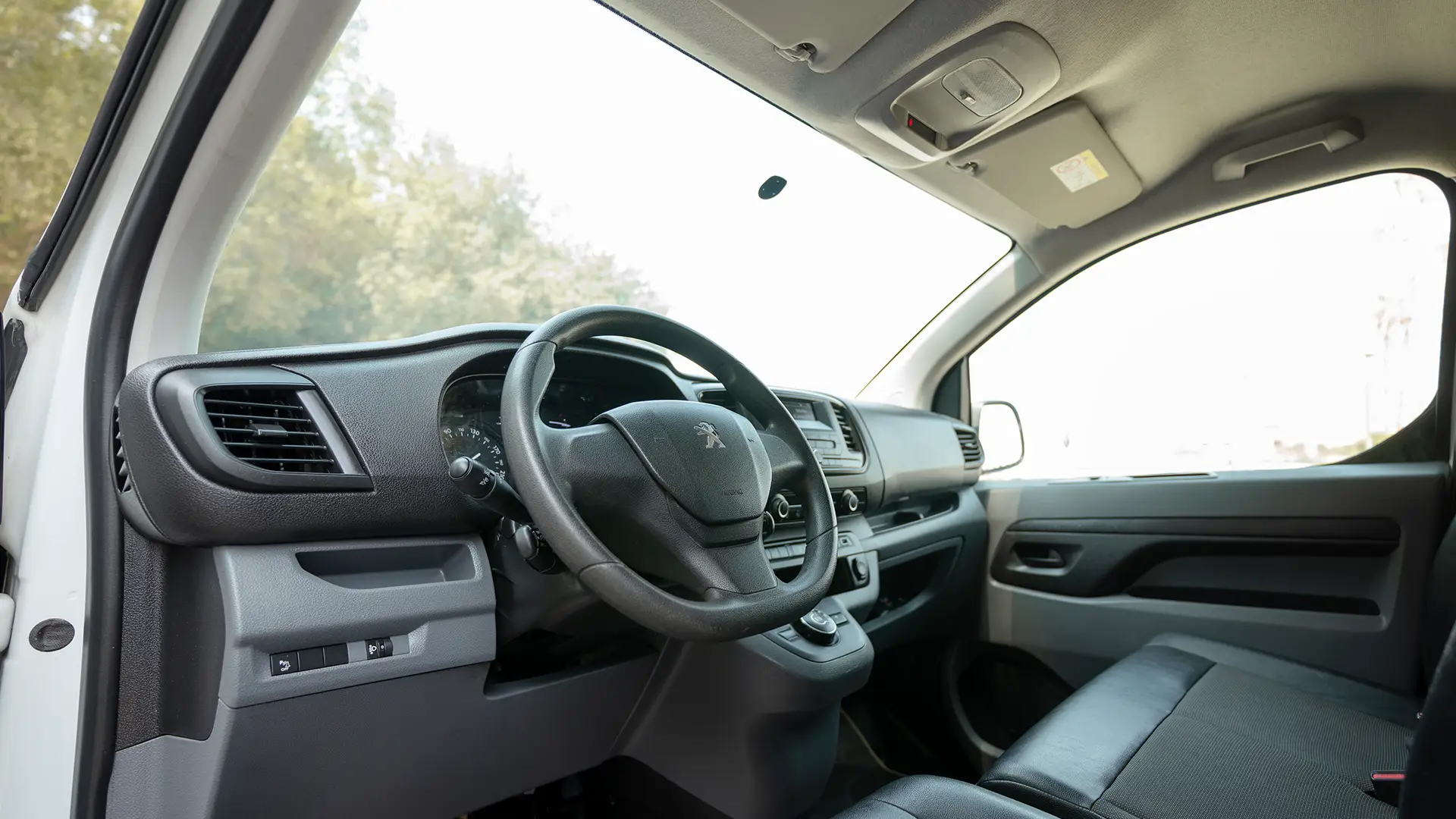 Used 2022 Peugeot Expert L3 in White – Driver Side Dashboard & Steering View for Sale at First Choice Cars Dubai Sharjah