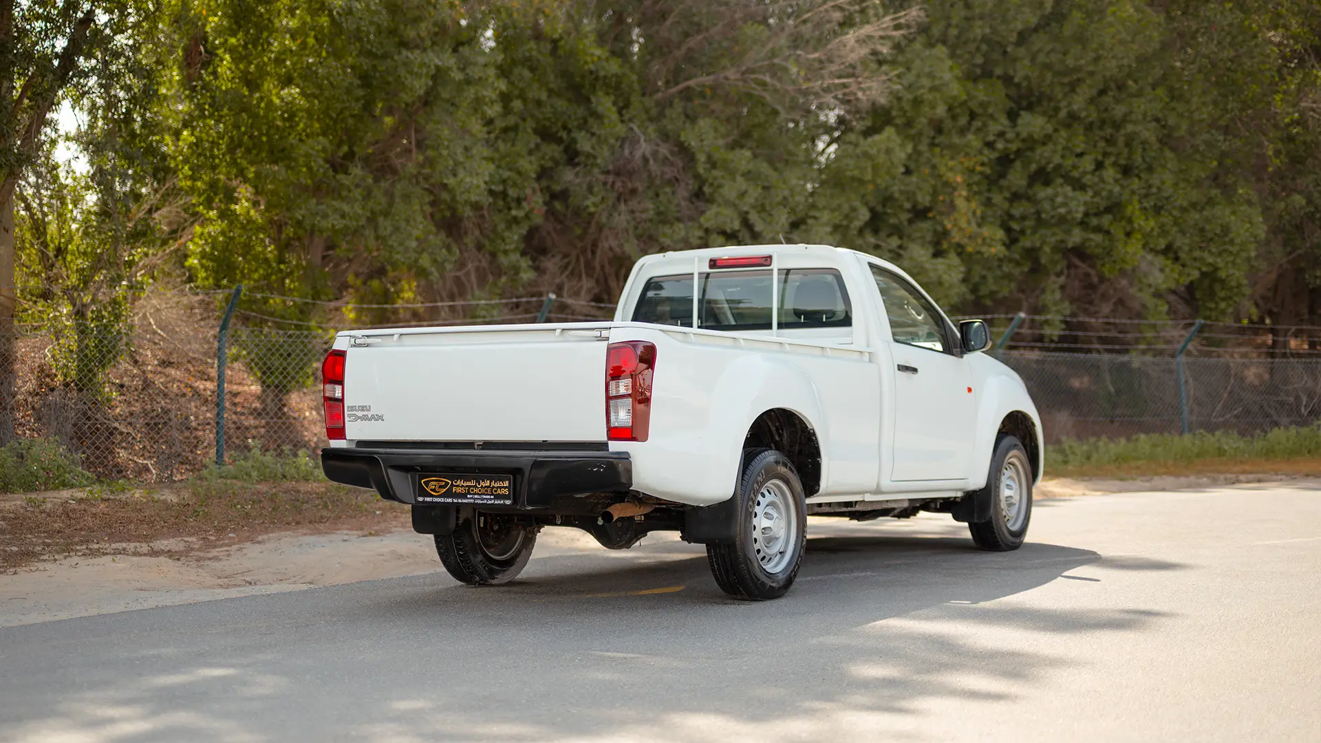 Used 2024 Isuzu D-MAX Single Cabin in White – Right Back Diagonal (45°) View for Sale at First Choice Cars Dubai Sharjah