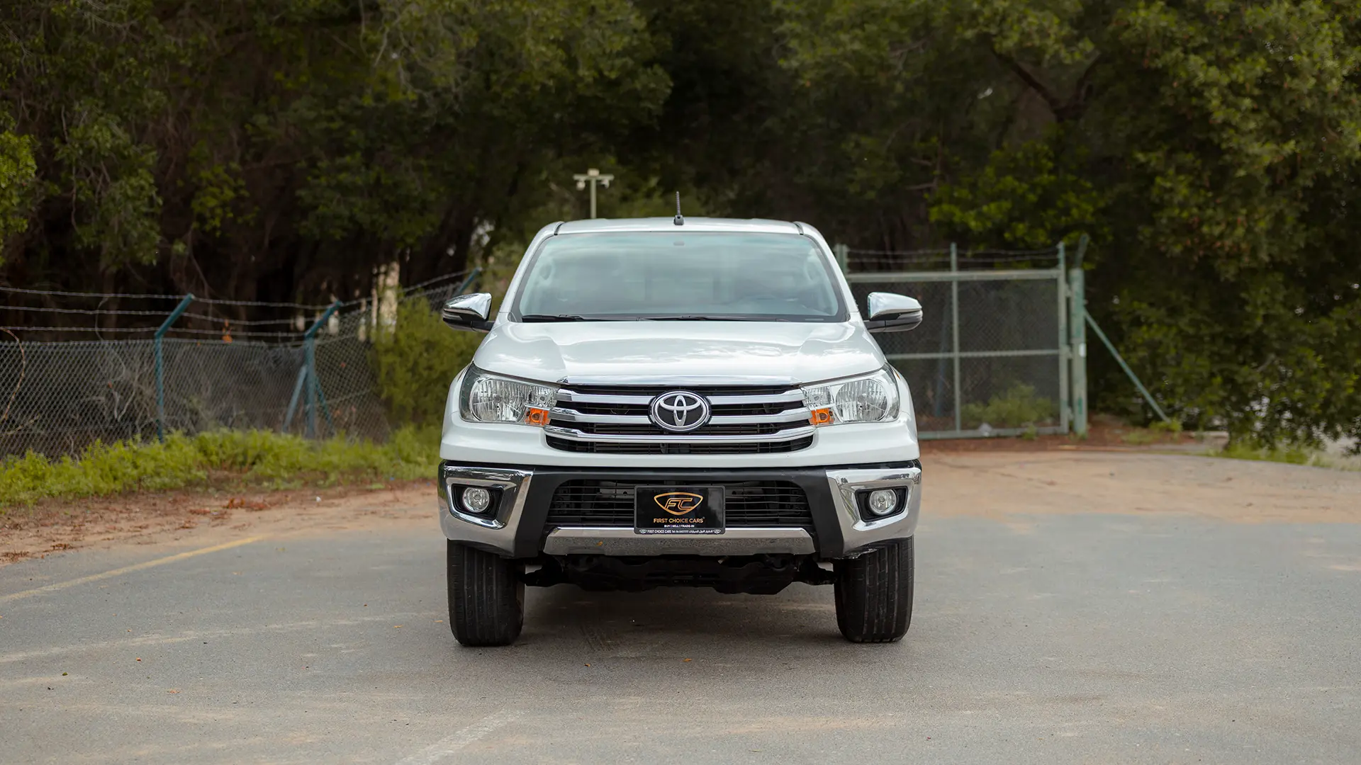 Used 2019 Toyota Hilux DLX Double Cabin in White – Front View for Sale at First Choice Cars Dubai Sharjah